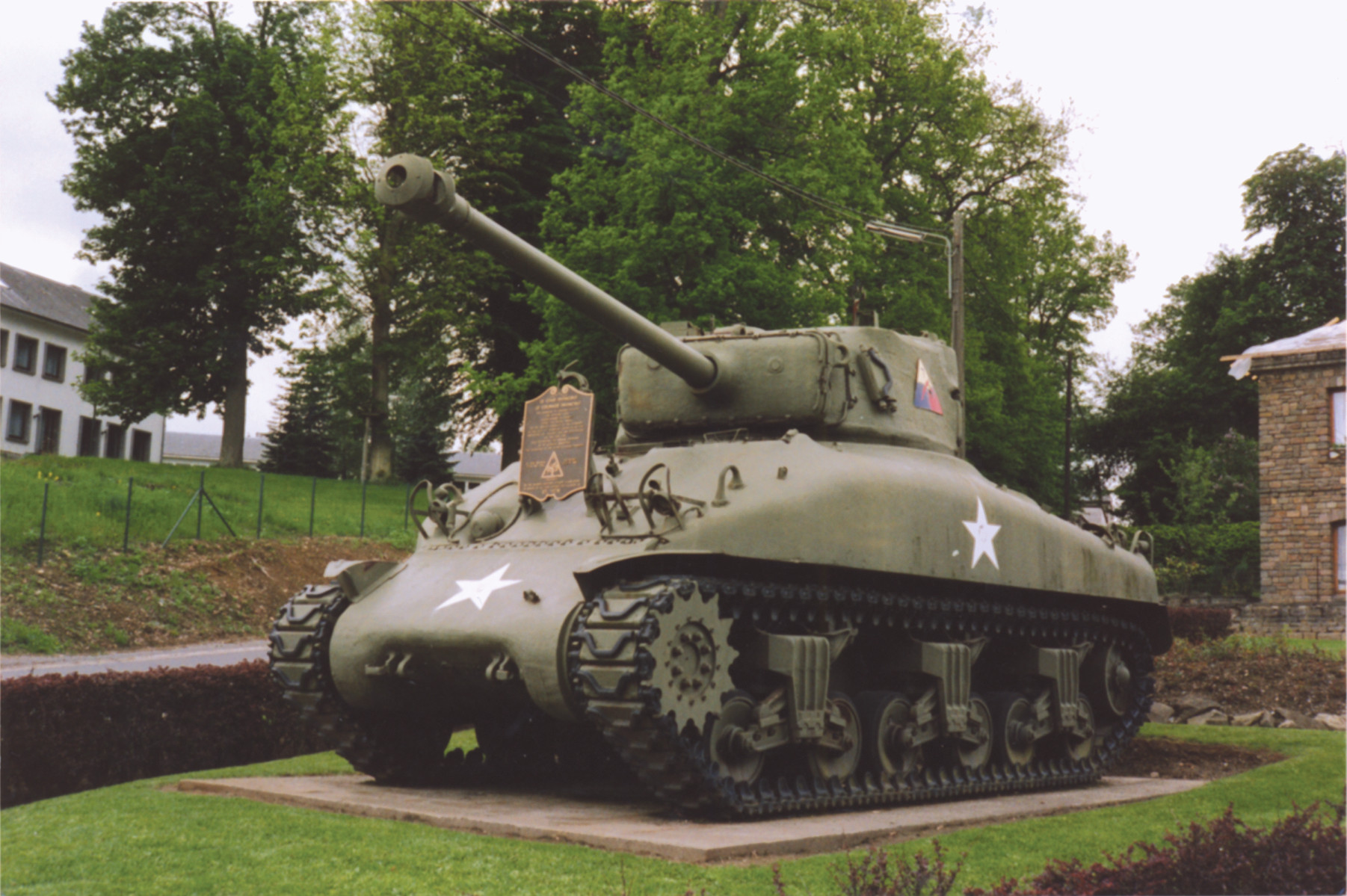 A Sherman tank from the 7th Armored Division lies at the outskirts of Vielsalm—marking the exit road out of the “fortified goose egg.