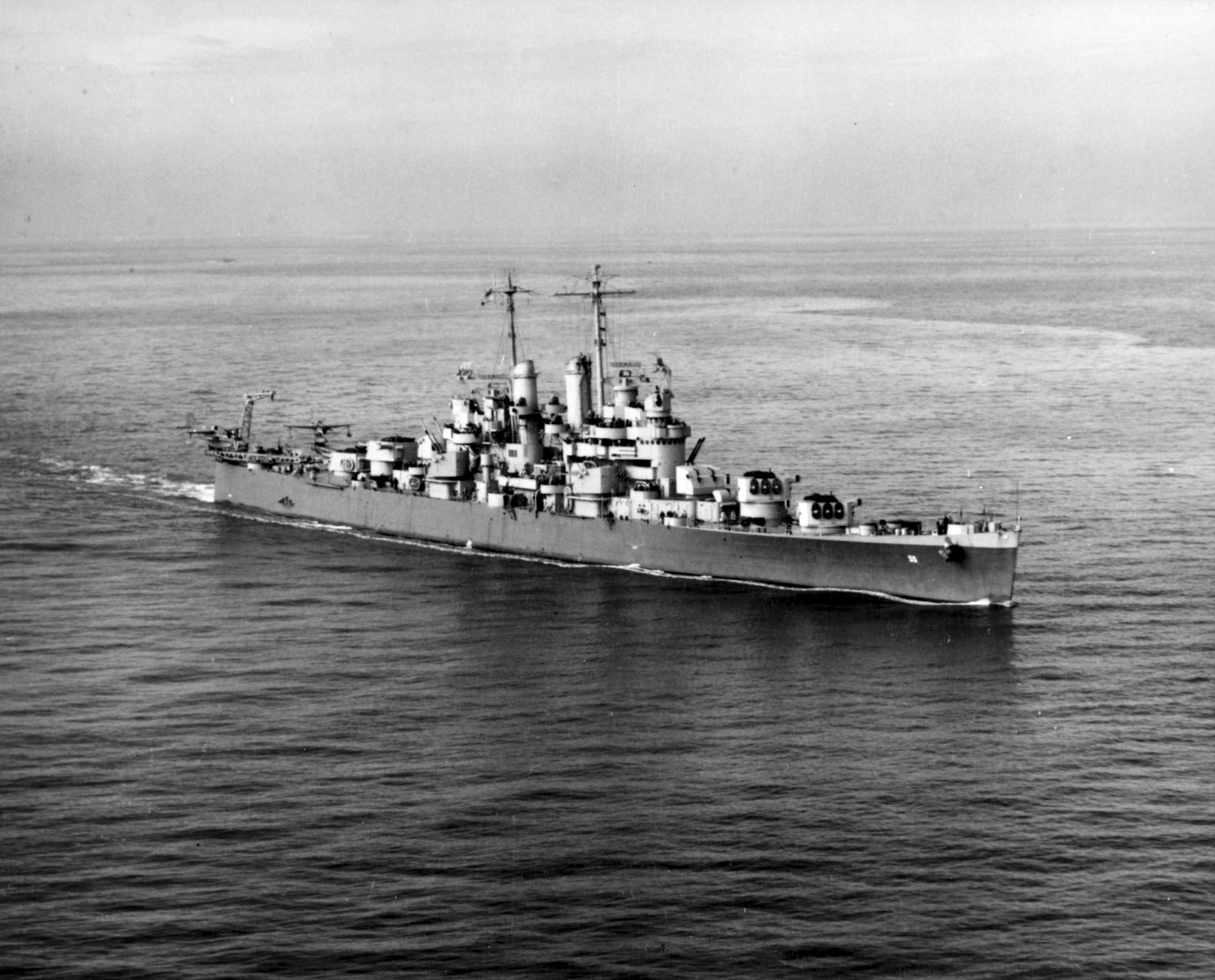 The light cruiser USS Cleveland, shown underway in 1942, was the lead ship of her class mounting 6-inch main guns. 