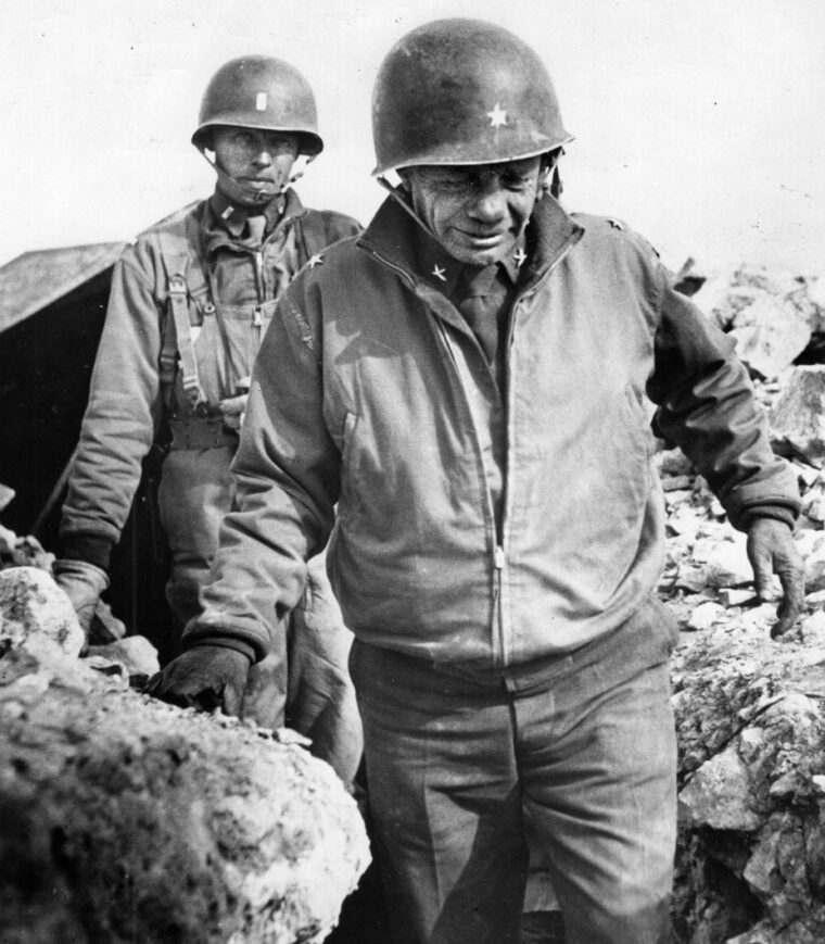Roosevelt, and his son, Captain Quentin Roosevelt, photographed in a slit trench. General Roosevelt received the Medal of Honor for his command presence on D-Day. 