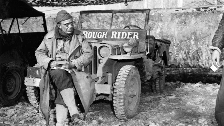 Brigadier General Ted Roosevelt reads mail while serving in Italy in January 1944. The son of President Theodore Roosevelt, he named his Jeep “Rough Rider” in honor of his late father and his exploits during the Spanish-American War.