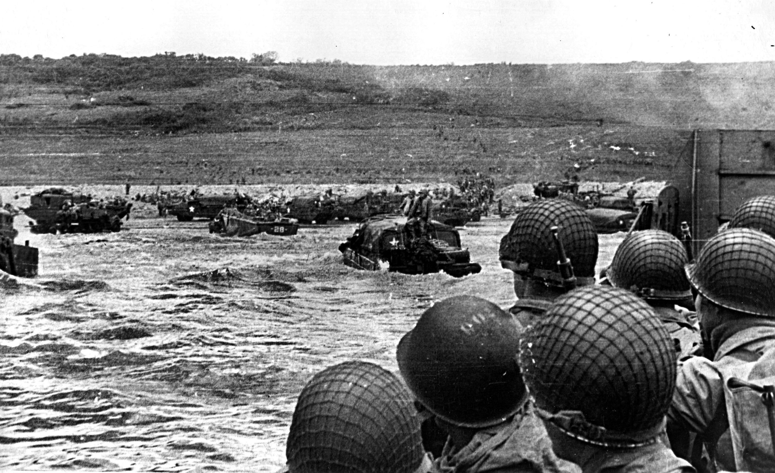 Soldiers of the U.S. 4th Infantry Division stream ashore at Utah Beach in Normandy on June 6, 1944. The 4th Division landed in the wrong place, but Roosevelt and Colonel James Van Fleet, commander of the 8th Infantry Regiment, famously resolved to start the war where they were. Roosevelt was the only Allied general officer to go ashore during the first wave on D-Day. 