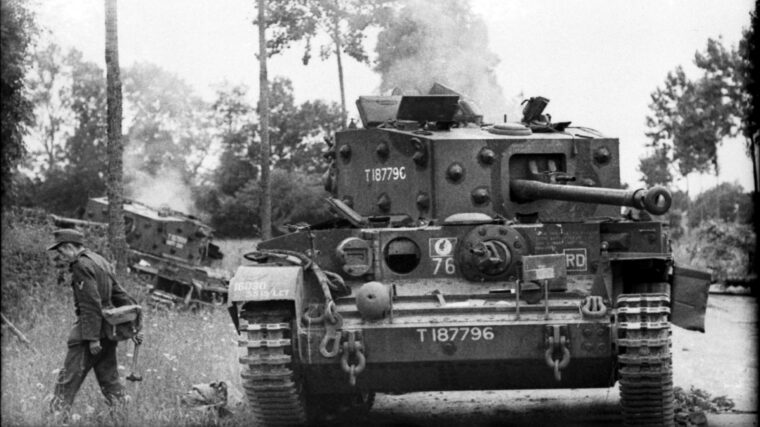 The Cromwell tank of Captain Roy Dunlop and another just to the rear with smoke billowing from it are shown near Point 213 after being immobilized by Tiger tanks east of Villers-Bocage. Both British tanks belonged to A Squadron, County of London Yeomanry.