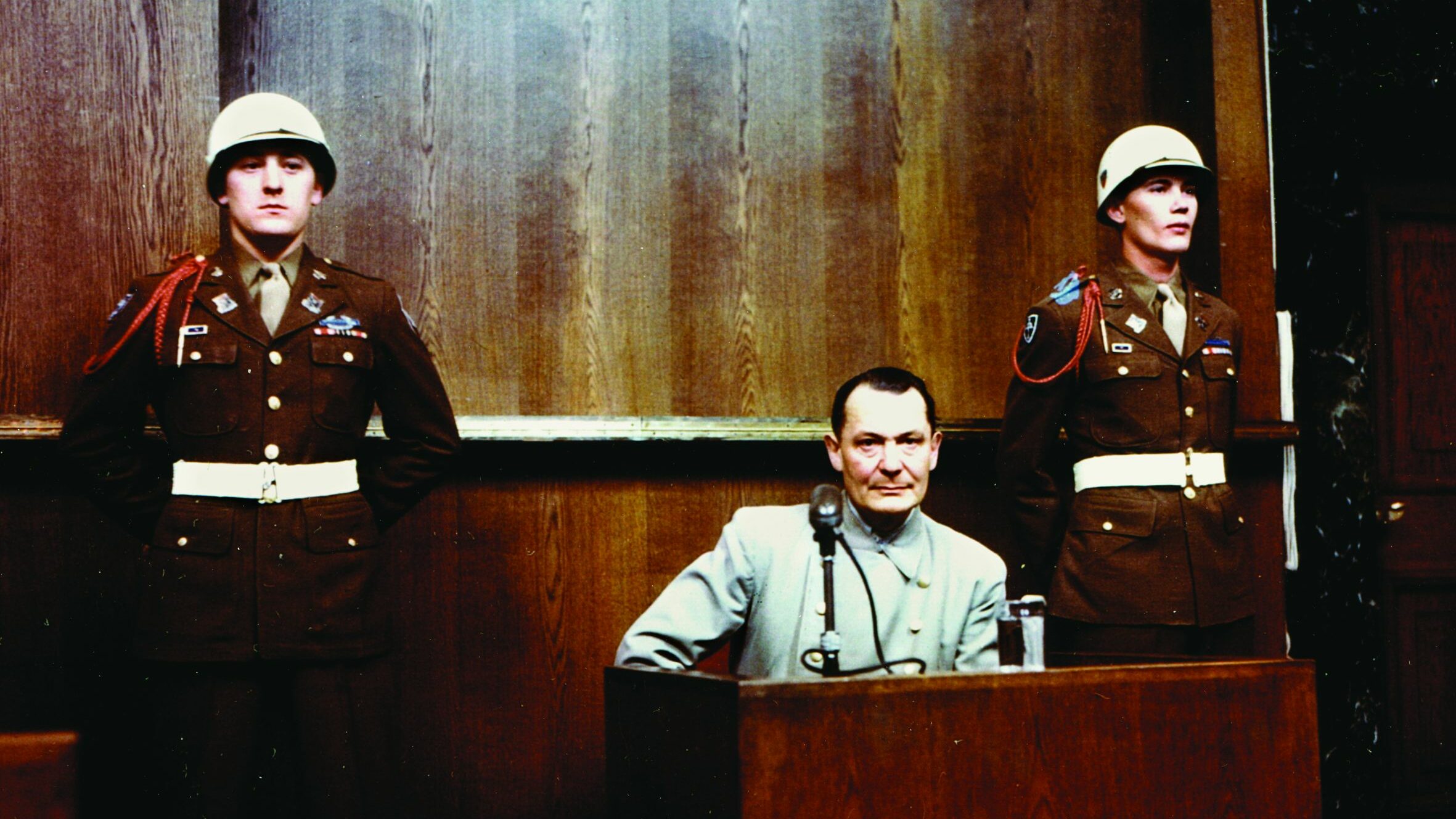 A gaunt Hermann Göring, former chief of the Nazi Luftwaffe, takes the witness stand during the Nuremberg trials.
