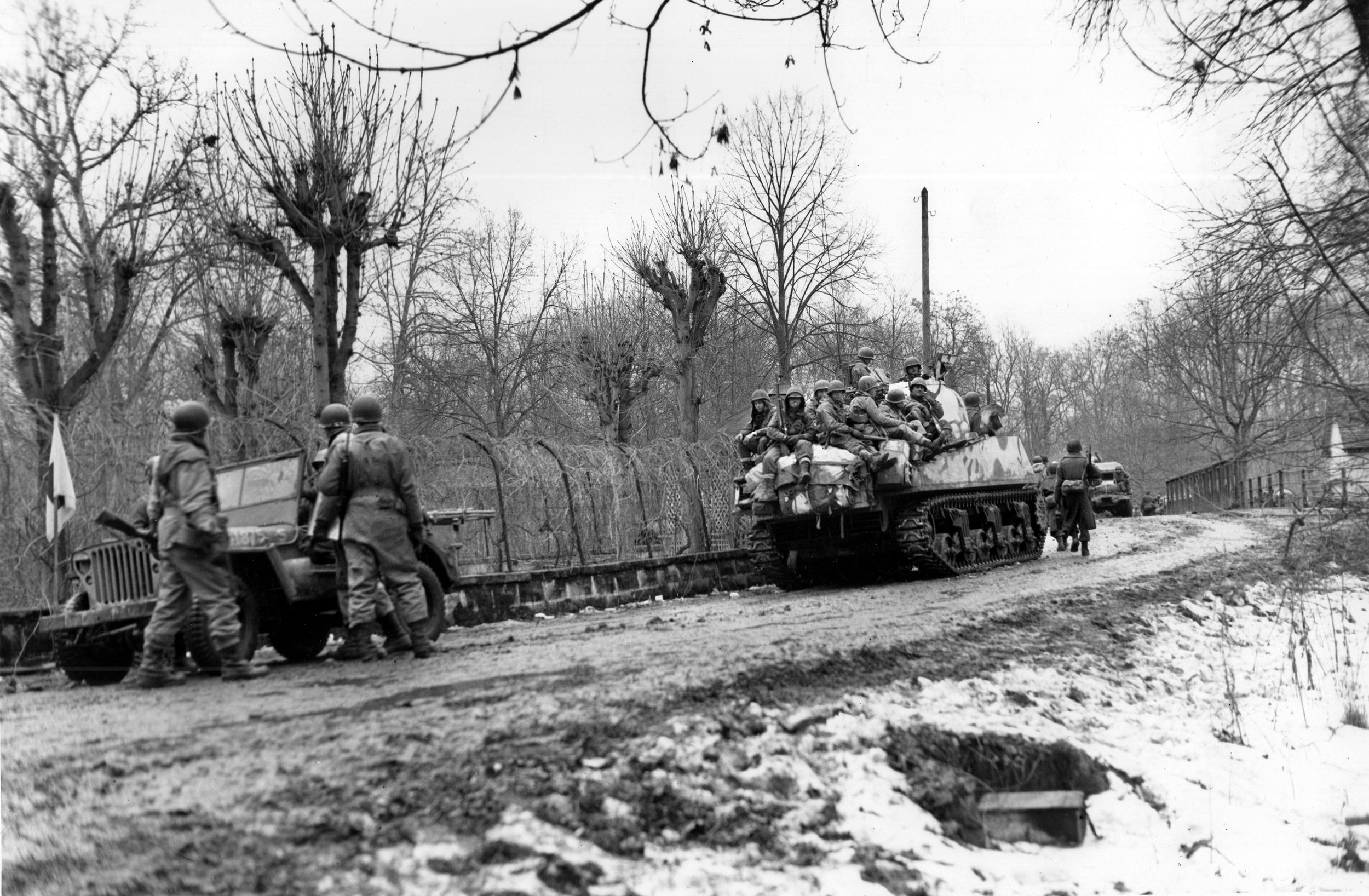 The U.S. XXI corps received reinforcements that included the U.S. 12th Armored Division, which pushed south in early February 1945 to cut off the retreating 
Germans and link up with the French I Corps advancing north