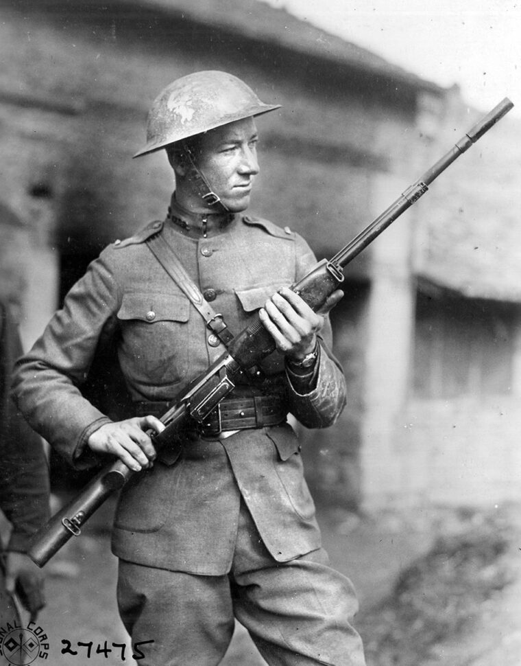 Lieutenant Val Allen Browning displays the BAR in 1918, the innovative weapon that was designed by his father, John Moses Browning.