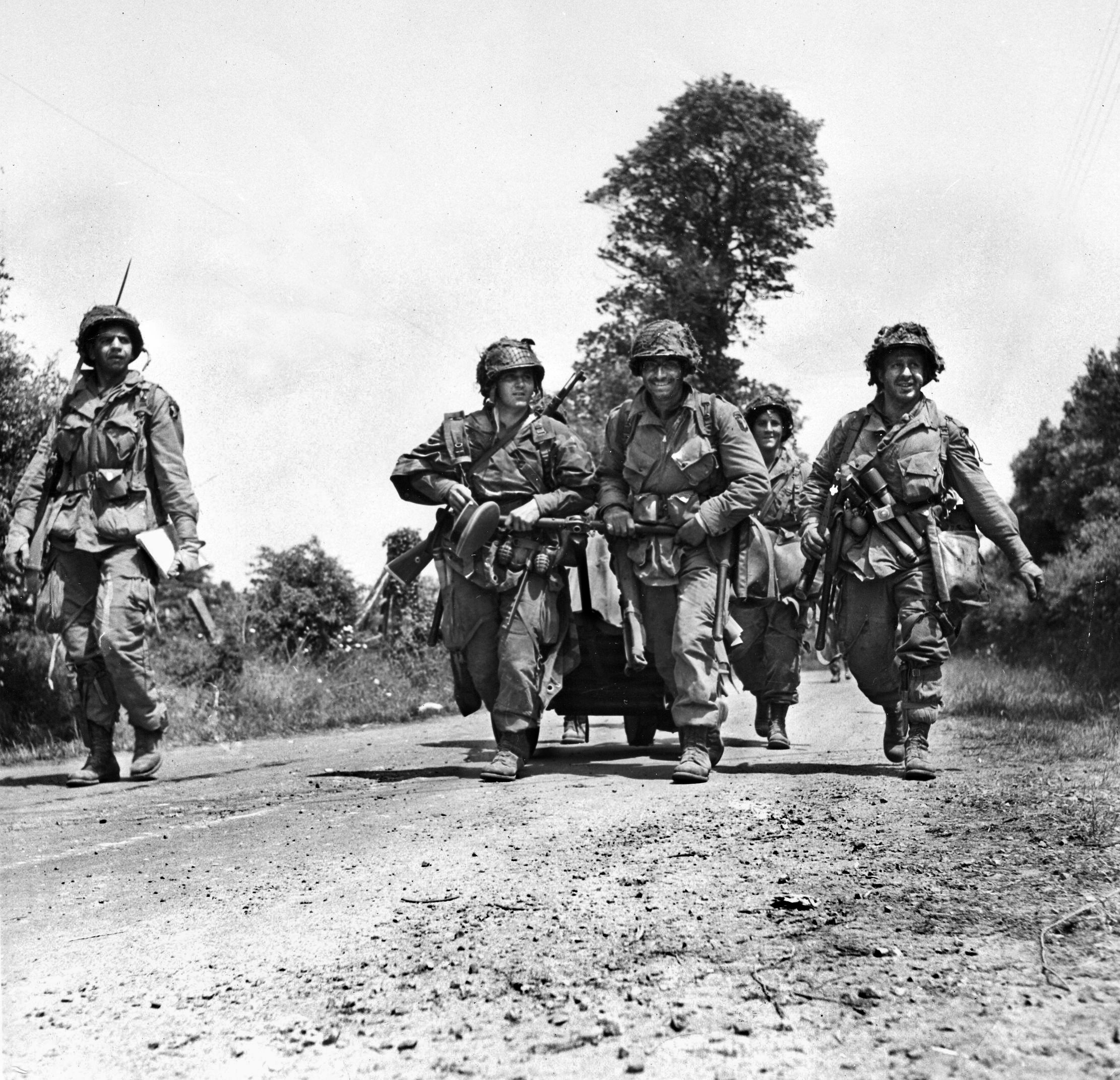 Paratroopers of the 101st Airborne Division tow a small mortar into battle during Operation Market-Garden, September 1944. 