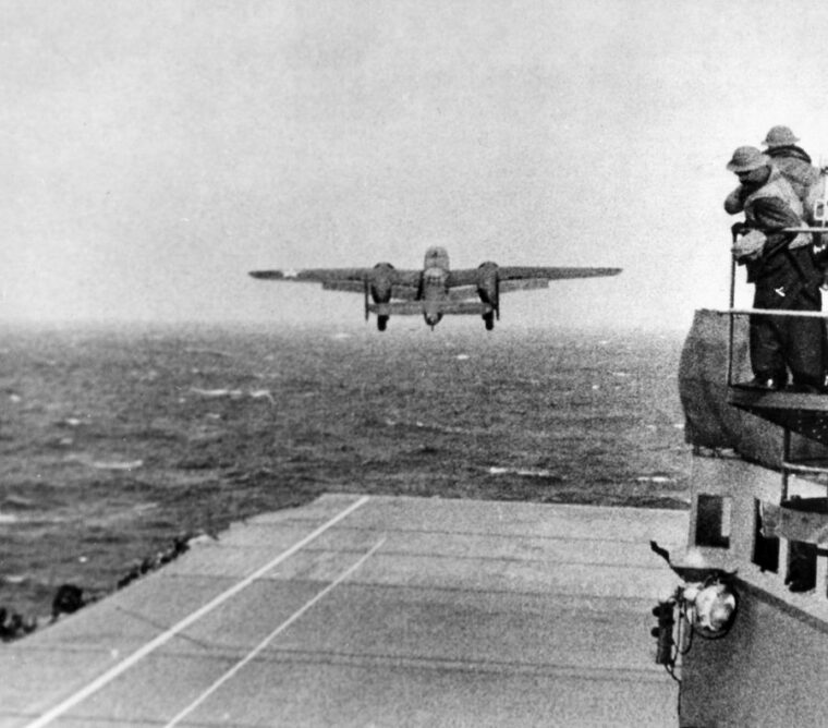 The A B-25B takes off from the deck of the aircraft carrier USS Hornet (CV-8) on April 18, 1942 during famous Halsey/Doolittle Raid.