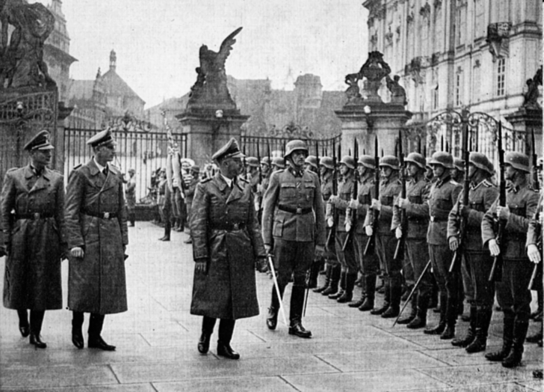 Heinrich Himmler, center, reviews troops in Prague in 1941 with Heydrich (second from left). 