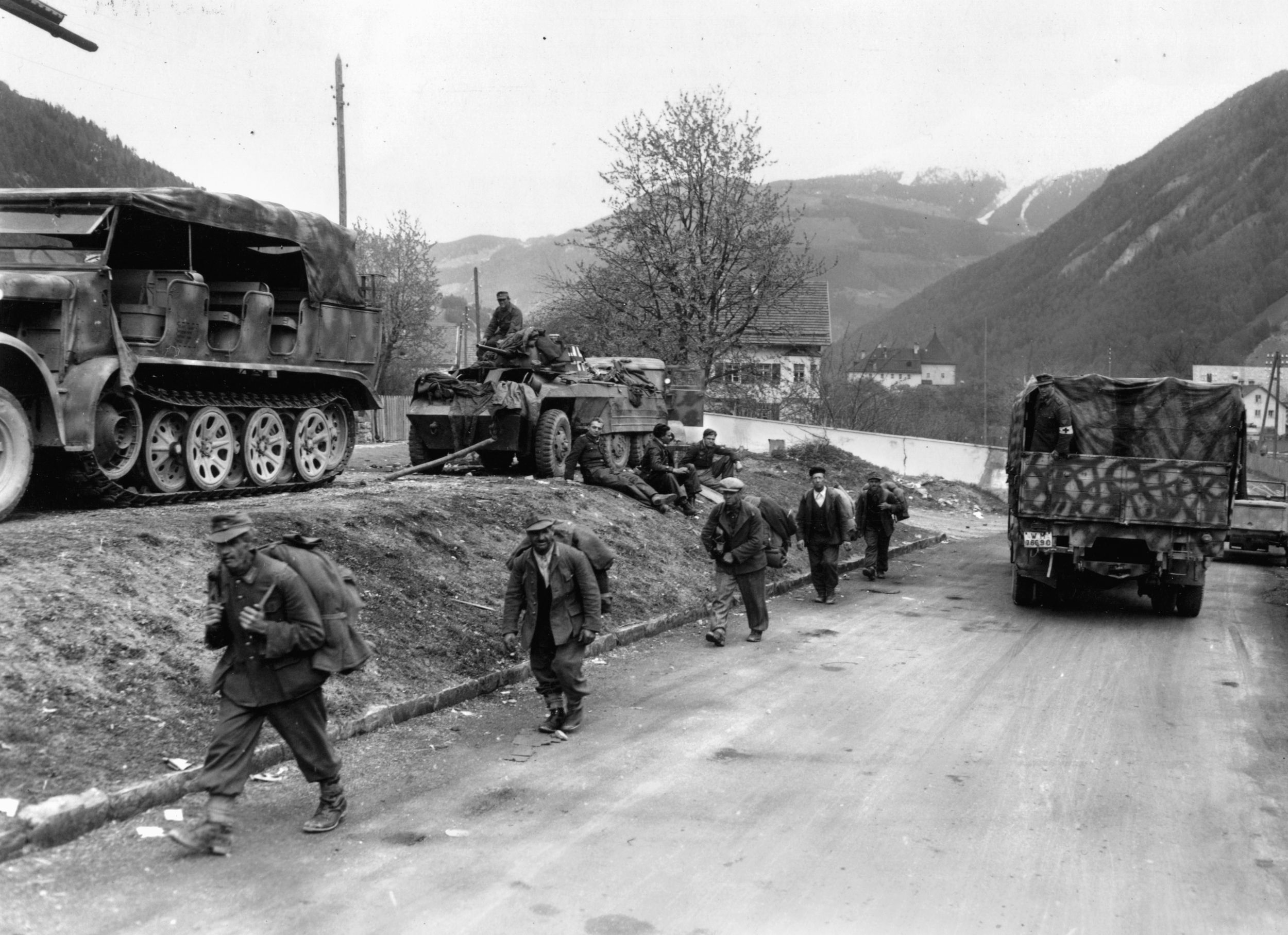Elements of the German Nineteenth Army wait for final instructions on their surrender to the American 44th Division in the Austrian Alps. 