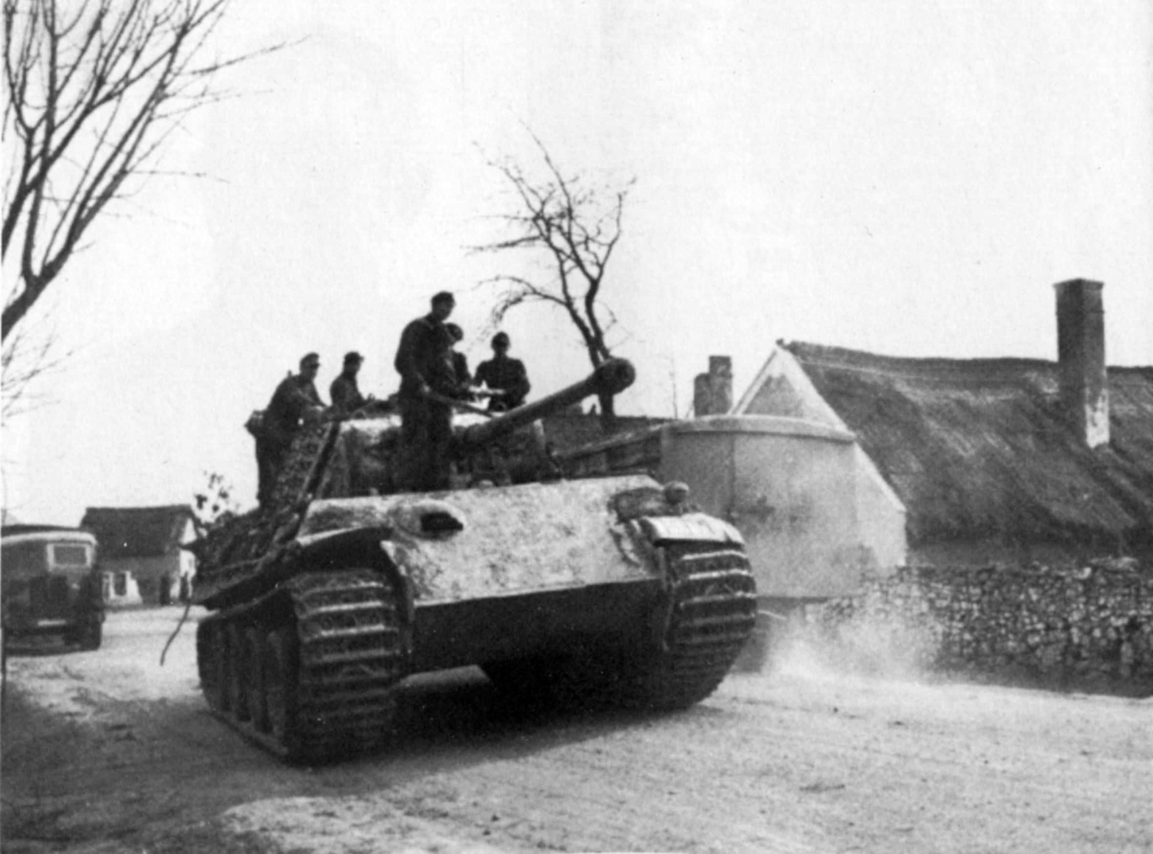 A Panther medium tank of the 12th SS Hitler Youth Panzer Division rolls forward in Hungary. The sloped armor of the Panther helped ward off enemy shells.