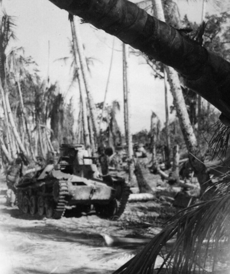 A destroyed Type 95 Ha Go light tank sits in the jungle at Biak, New Guinea, in 1944.  Japanese armored development lagged behind that of Western nations, and inferior Japanese tanks were no match for their American counterparts.