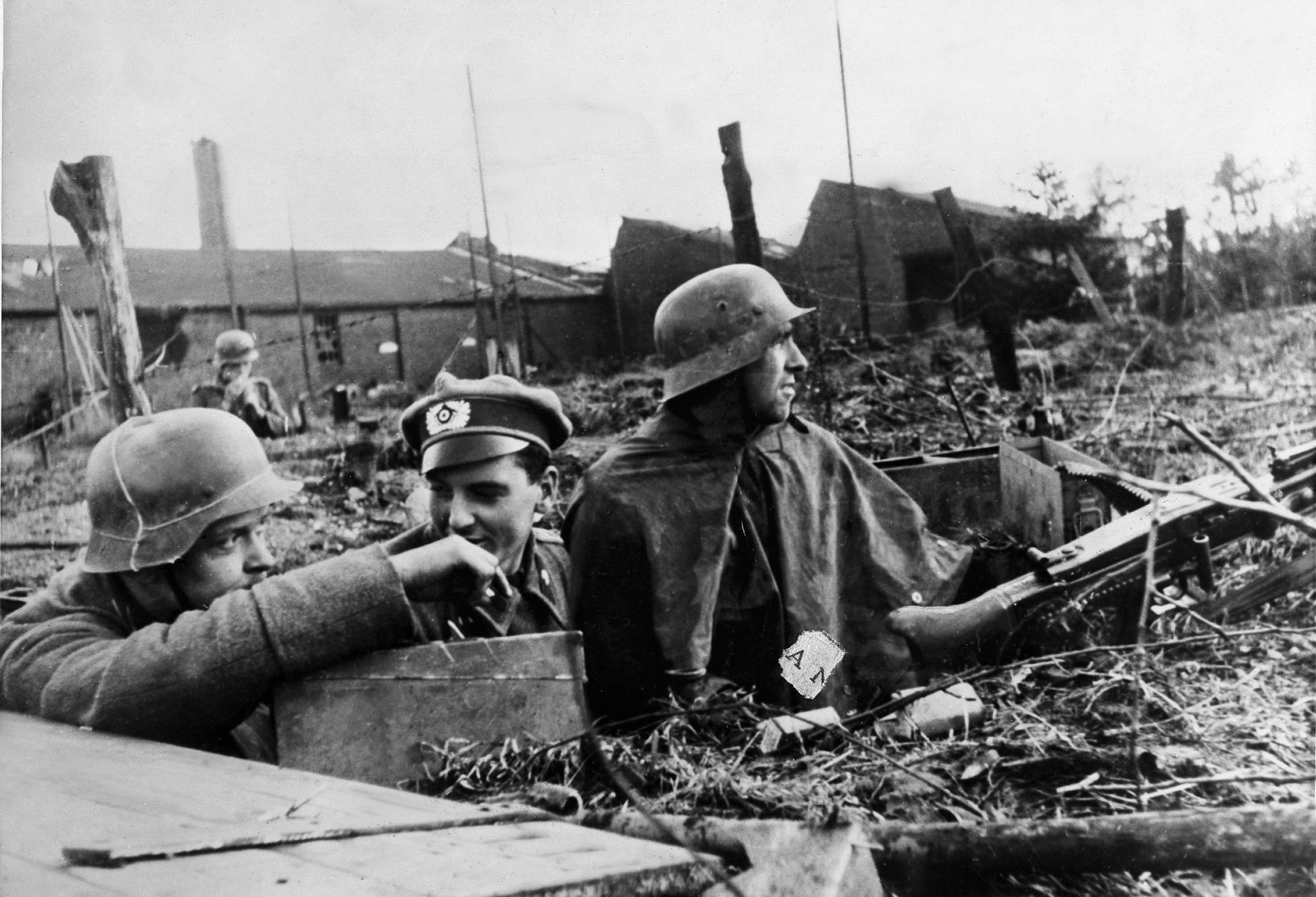 German infantrymen and their platoon leader man a position on the Rur front, December 14, 1944.