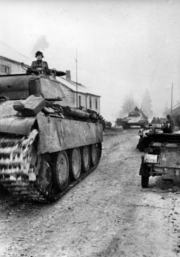 Advancing toward the defensive positions of the 28th Infantry Division, PzKpfw. V Panther tanks of the German Panzer Lehr Division roll through Luxembourg. 