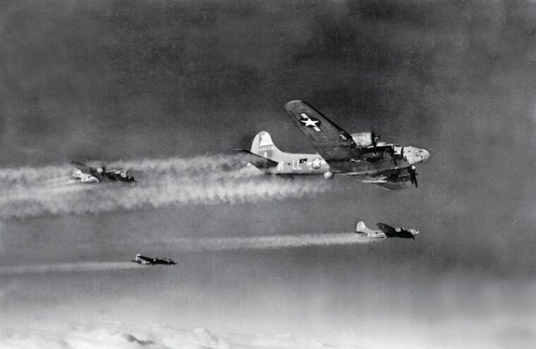 U.S. Army Air Forces Boeing B-17 bombers fly in formation en route to a target in Germany. Enemy fighters and antiaircraft fire took a heavy toll on the airmen aboard.