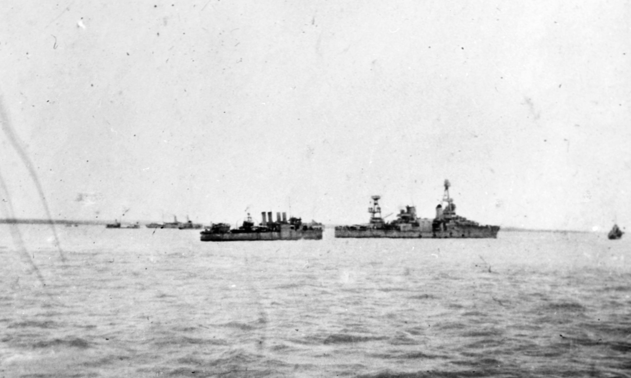 In this photo taken in harbor at Darwin, Australia, Houston is anchored near the destroyer USS Peary (left). Houston was sunk 10 days later.