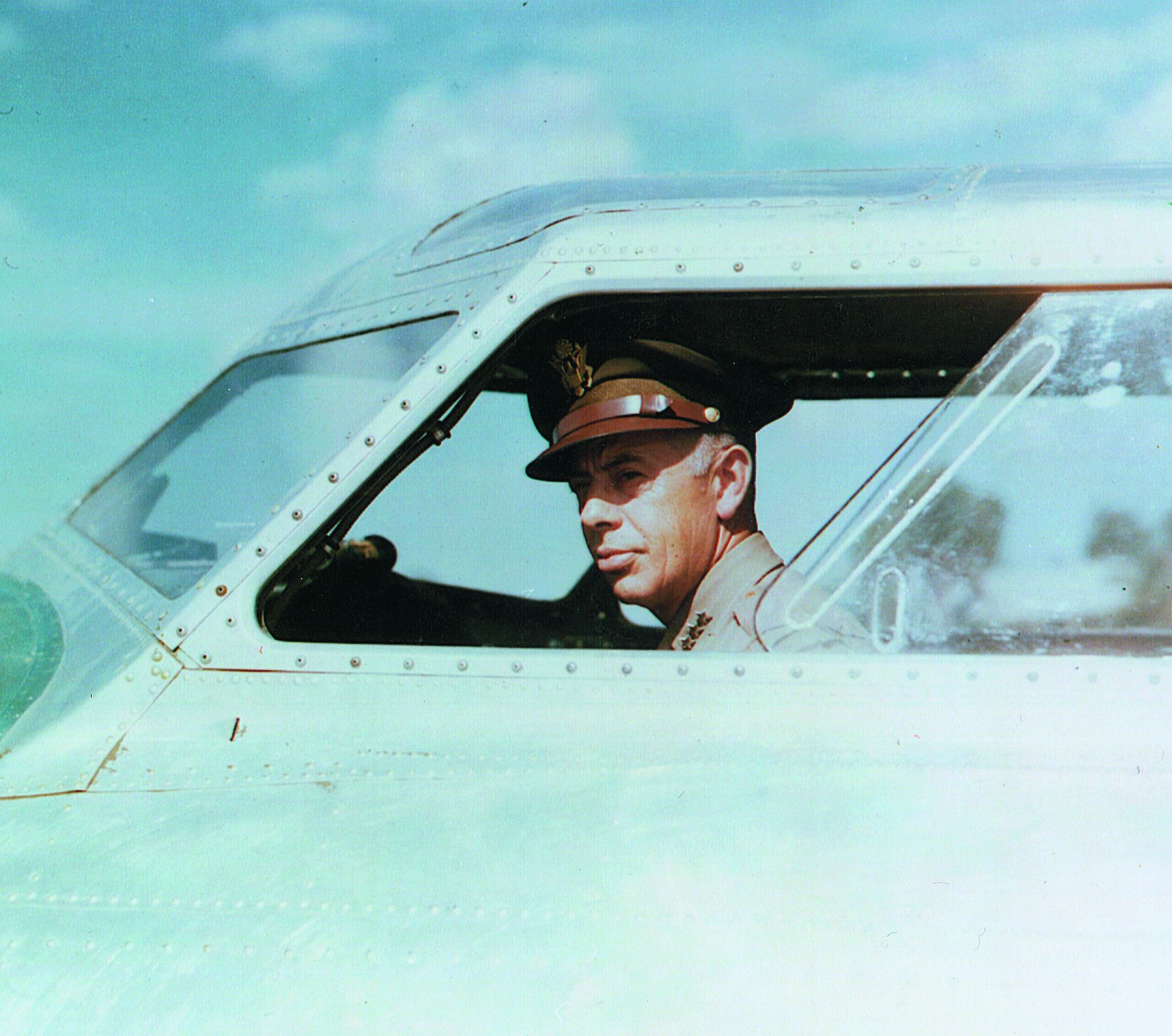 General George C. Kenney in the cockpit of a B-17. 