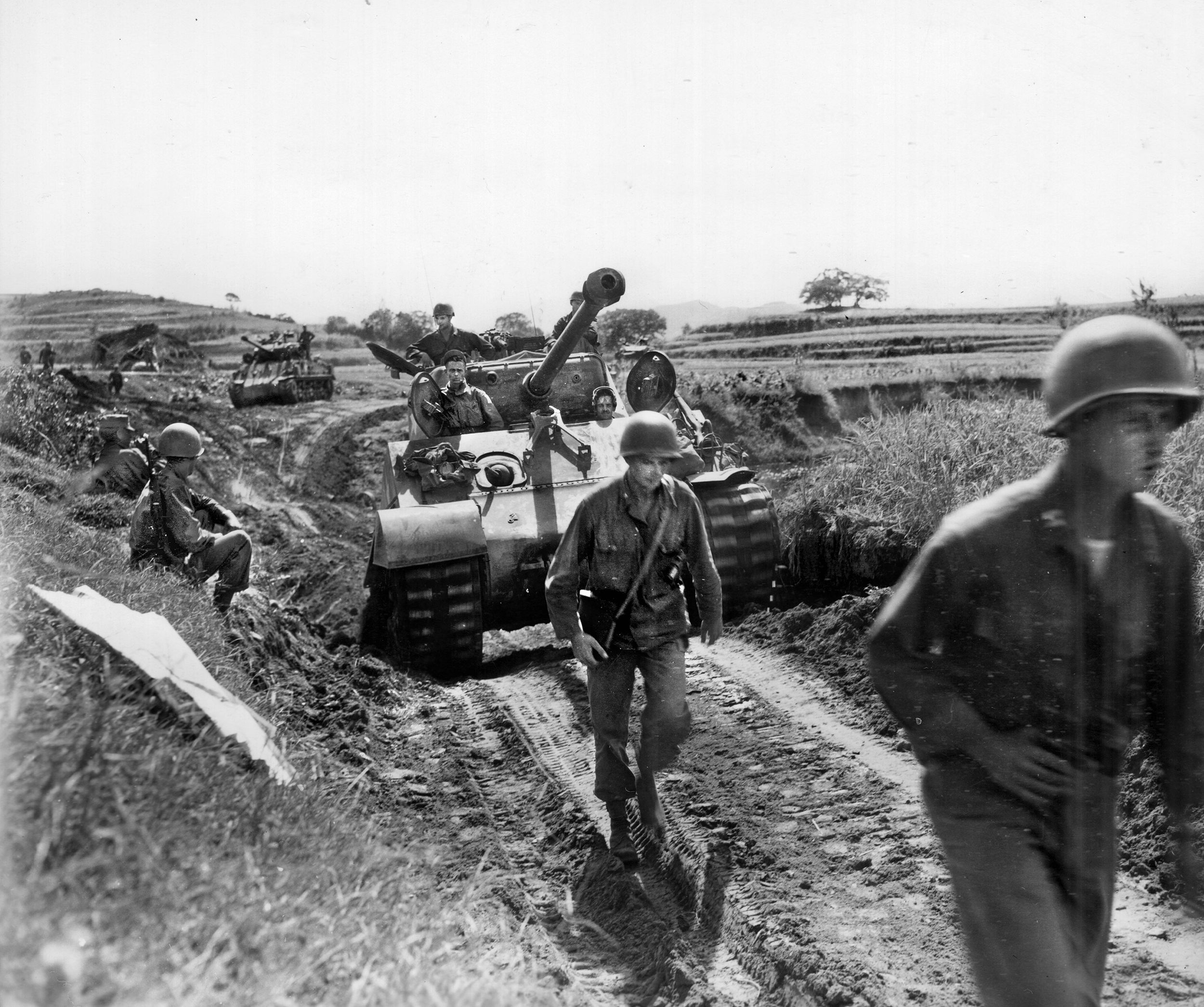 American troops accompanied by M4 Sherman tanks advance against the North Korean forces near Chongju, South Korea in September 1950. The United Nations forces kept pushing north hoping to destroy remnants of the North Korean People’s Army and put an end to the war. 