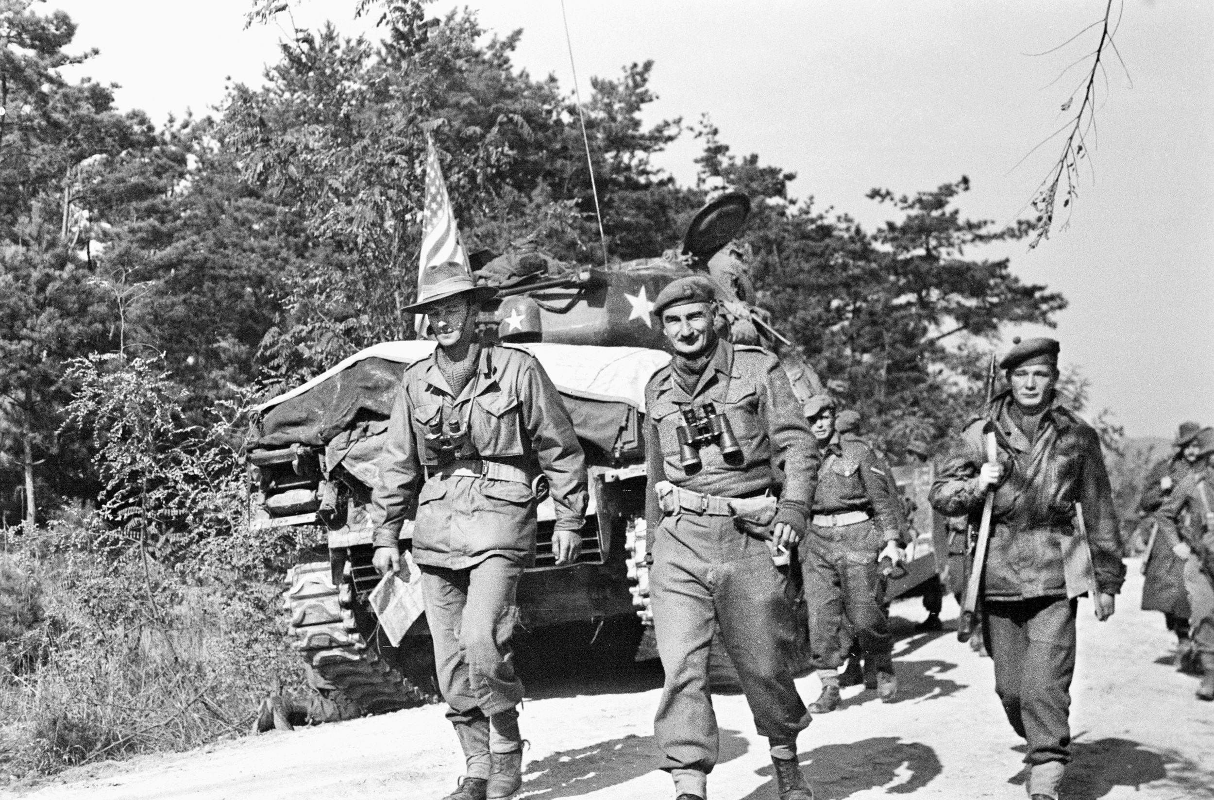 Australians Lieutenant Colonel Charles Green, left, and Brigadier General Basil Coad return from a reconnaissance where they encountered North Korean troops a half mile east of Chongju, North Korea, on the morning of Oct. 29, 1950. The U.N. forces would take Chongju from the retreating NKPA two days later. That evening, an incoming artillery shell mortally wounded Green, who died on November 1. The U.S. Army posthumously awarded him a Silver Star.
