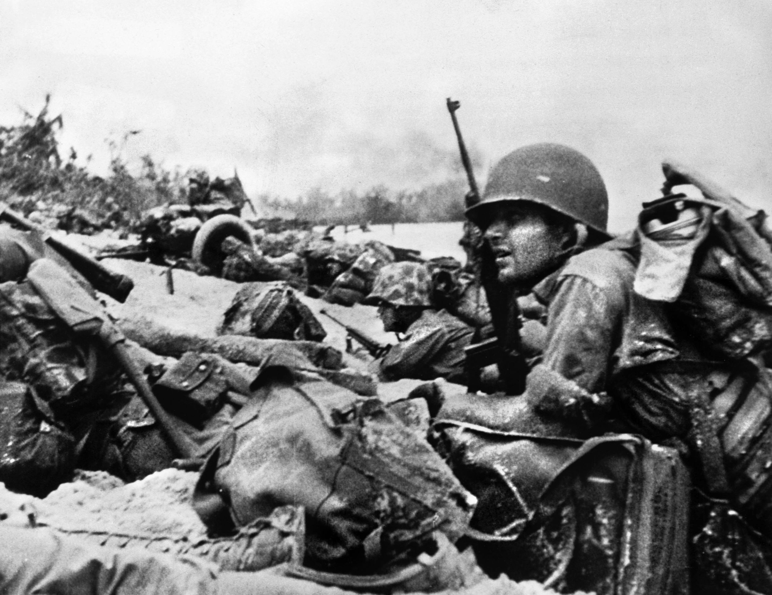 Members of the 1st, 5th and 7th Marine regiments continued to endure withering machine gun, mortar and artillery fire after storming the beach.