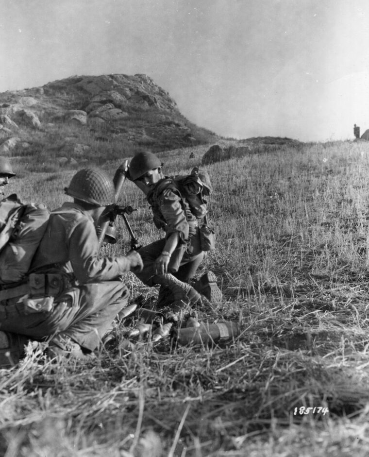 An 81mm mortar crew from the 3rd Infantry Division’s 15th Infantry Regiment fires at enemy positions during the division’s drive on Campobello, Sicily, July 1943. Of the 40 Medals of Honor awarded to men of the 3rd, two were earned during the month-long campaign for Sicily.