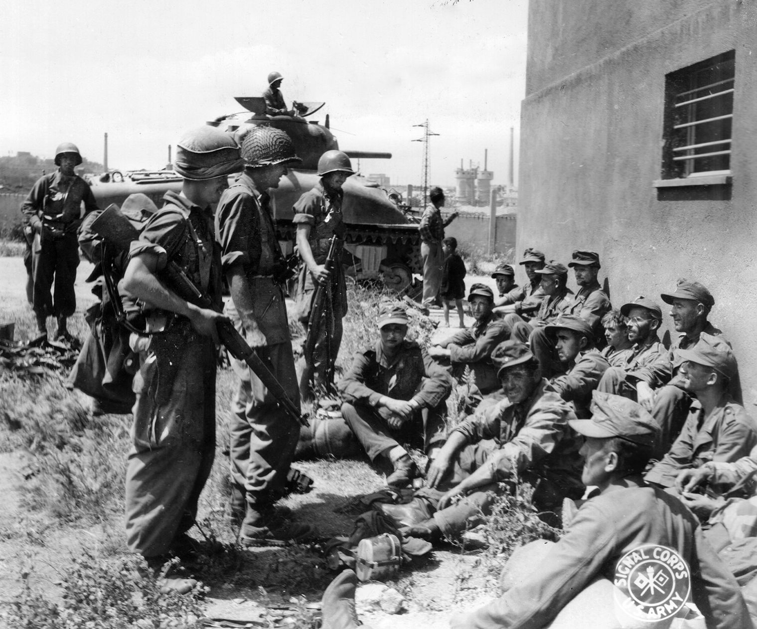 Third Infantry Division troops guard German soldiers taken prisoner at Artena, Italy, near Rome in May 1944. Rudolph Davila earned his Medal of Honor during this action.