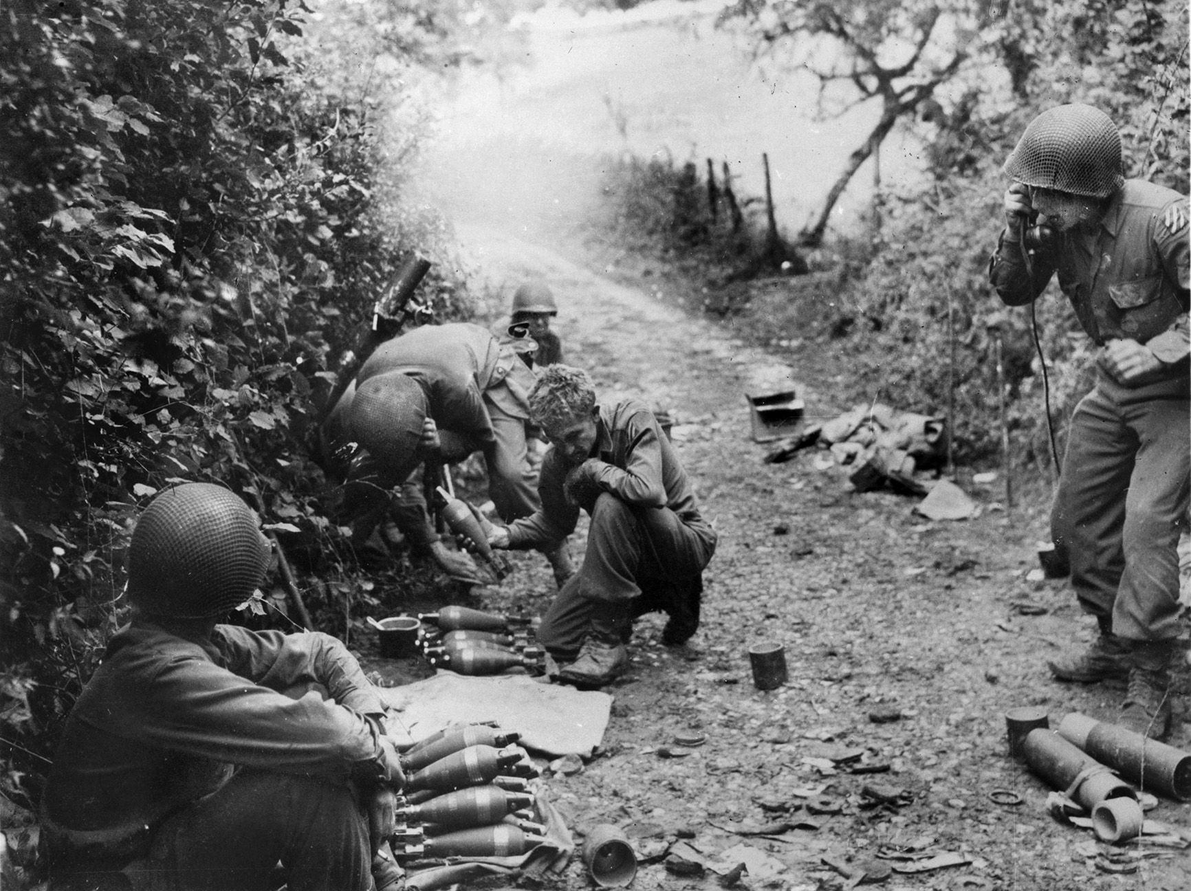 On September 9, 1944, a 3rd Division mortar squad blasts the enemy near the Swiss border in the Rigney, France, area. The Germans made a furious stand to keep the Americans from entering Germany.