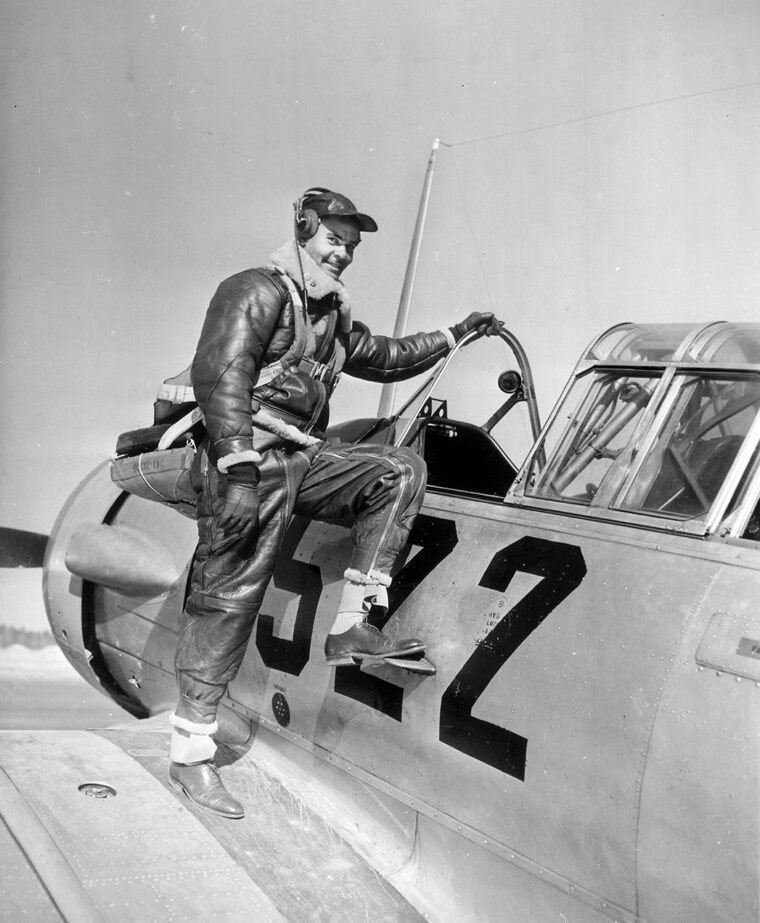 Captain Benjamin O. Davis poses with his training aircraft during instruction at Moton Field, Tuskegee, Alabama. Davis would later command the 99th Pursuit Squadron and 322nd Fighter Group.