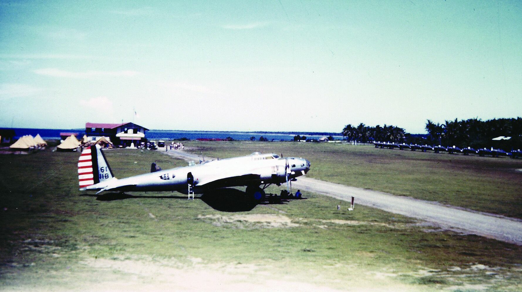 A B-17D Flying Fortress sits on the tarmac at Iba Field, Philippines, while visiting from Clark Field in October 1941 on the eve of war. The following month, the 19th Bombardment Group was formed. By the time the Japanese attacked in December, most of the 19th Group's B-17Ds had been repainted in a khaki camouflage scheme.