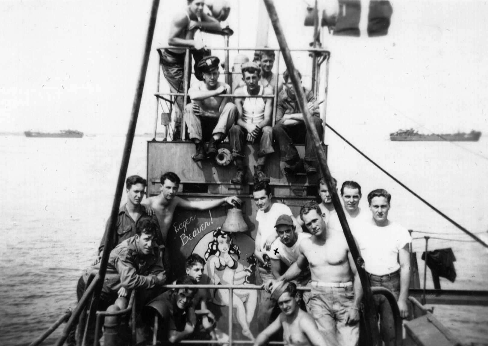 John Wayne Auld (in baseball cap) and fellow crewmen aboard an LCT in the English Channel. 