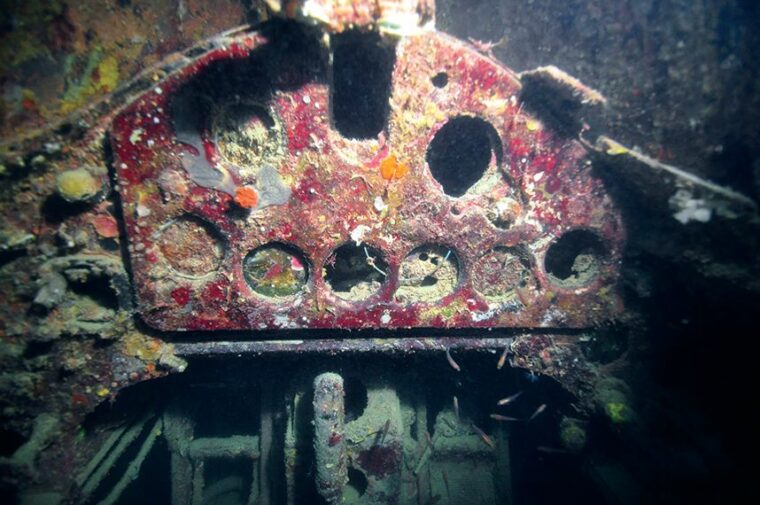 The instrument panel of the Gavutu Wildcat. Years of corrosion have caused some instruments to dislodge from the panel and fall behind it.