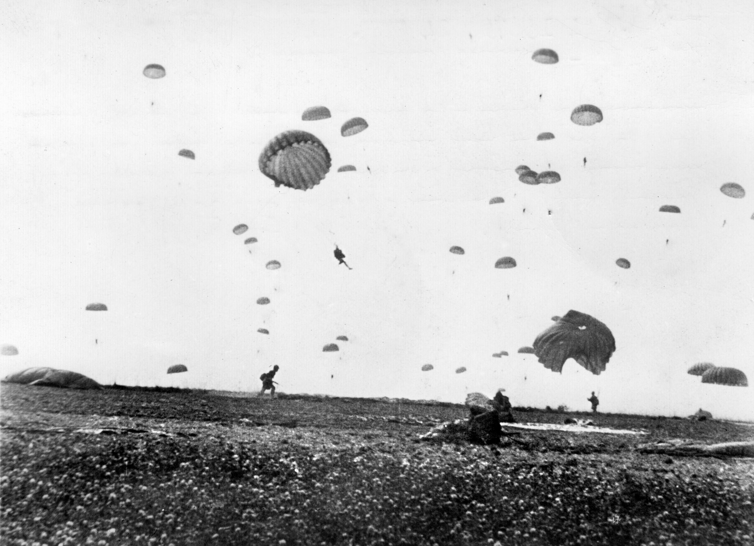 During the opening phase of Operation Market-Garden, U.S. paratroopers of the 505th Parachute Infantry Regiment land in an open field designated drop zone “N.”
