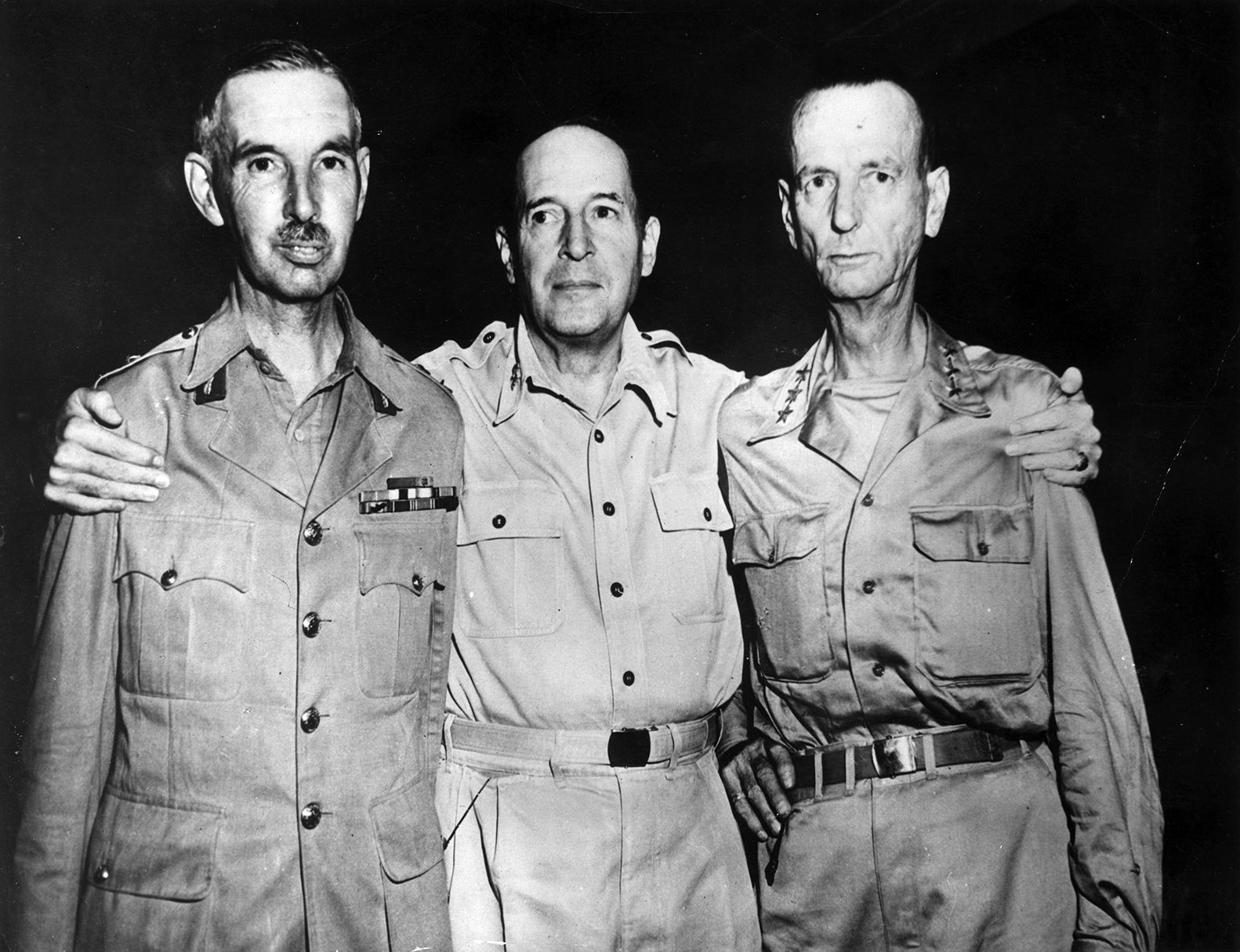 Percival, left, with General Douglas MacArthur (center). On the right is General Jonathan M. Wainwright, who surrendered Allied troops in the Philippines to the Japanese in the spring of 1942 and also endured harsh captivity. Both liberated commanders were present with MacArthur during the surrender of Japan aboard the battleship USS Missouri in Tokyo Bay, September 2, 1945.