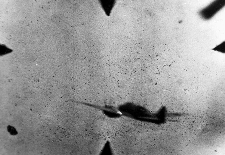 Caught in the gun camera of an attacking U.S. fighter, this Japanese Ki-46 Type 100 fighter, known to the Allies as a “Dinah,” jigs to avoid devastating fire from American machine guns.