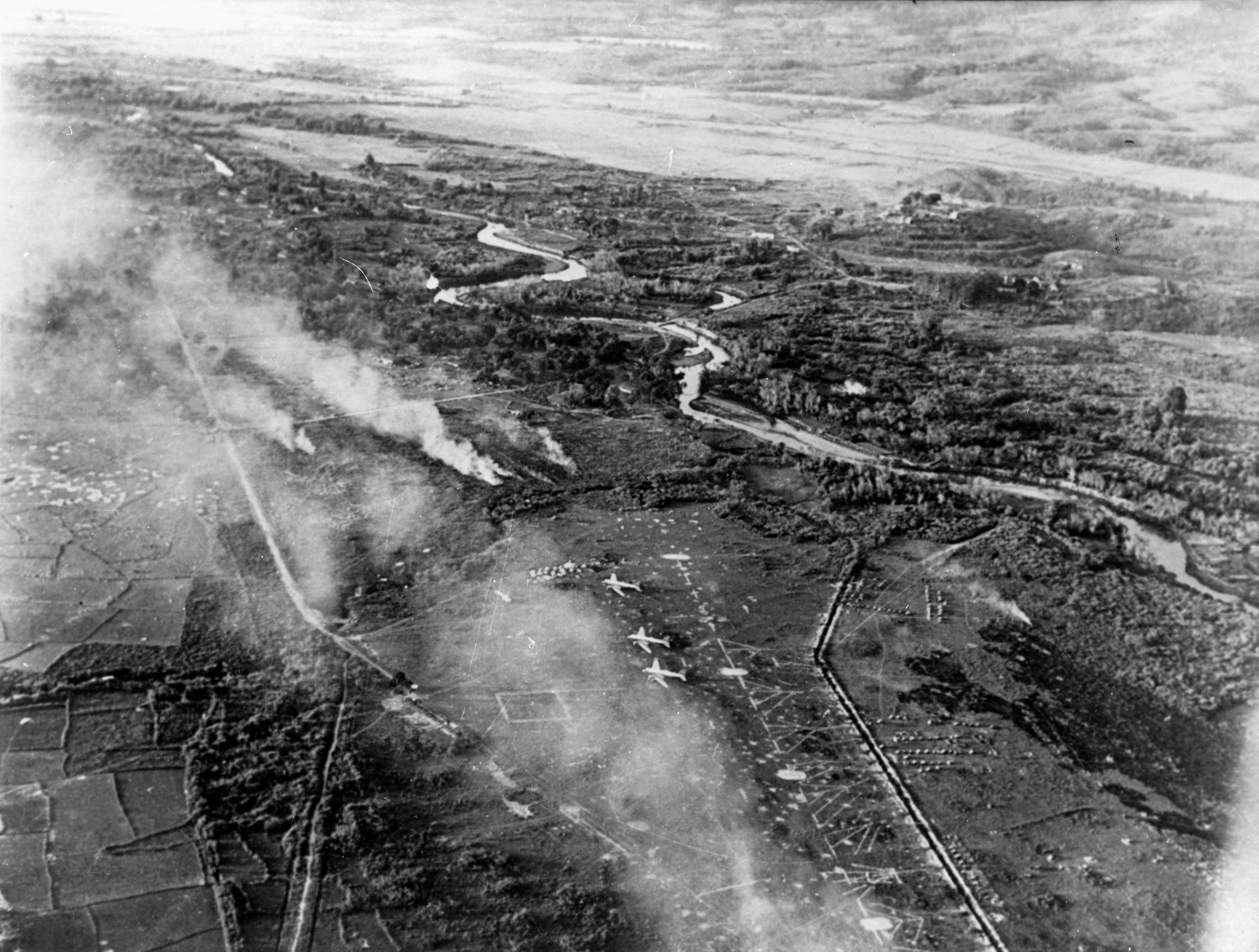 The smoke-shrouded airstrip at Dien Bien Phu was closed in late March 1954 after heavy Viet Minh shelling. 