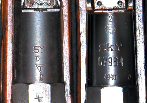 A side-by-side view of the barrel-shank tops of a Civil Guard Model 28, and a Civil Guard Model 28-30. 