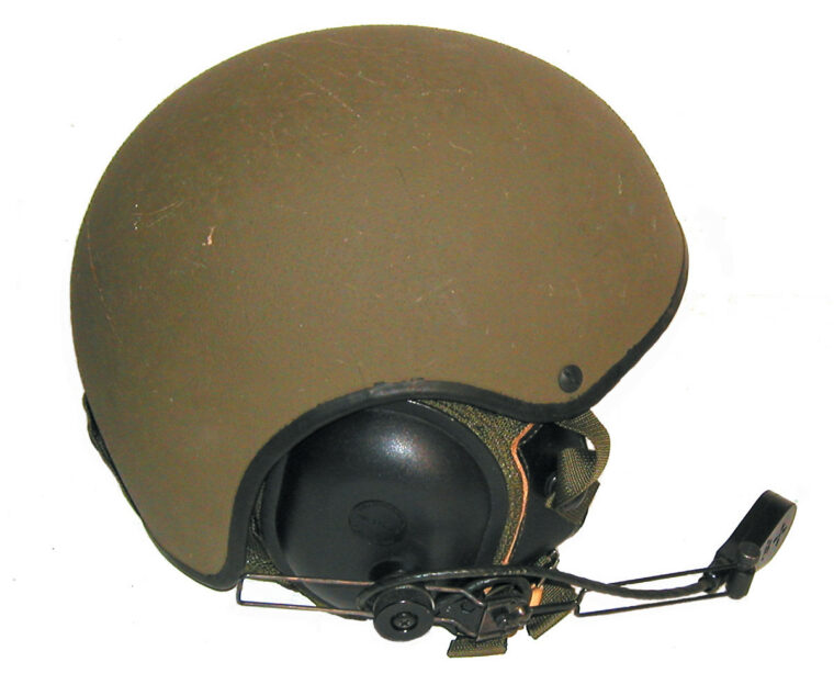 The American DH-132 tanker helmet, or Combat Vehicle Crewman's helmet (CVC), was developed in the 1970s by the Gentex Corporation. It was a four part system with an outer shell, inner liner, earphones, and a microphone. The outer shell is made of Kevlar and resins.