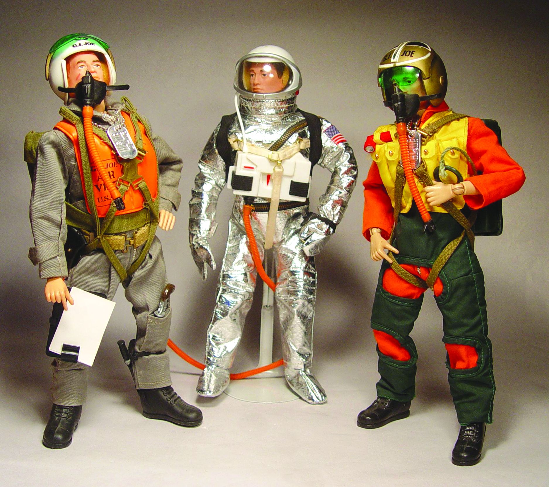 GI Joe Action Pilots flank the GI Joe Astronaut, all wearing complete gear.