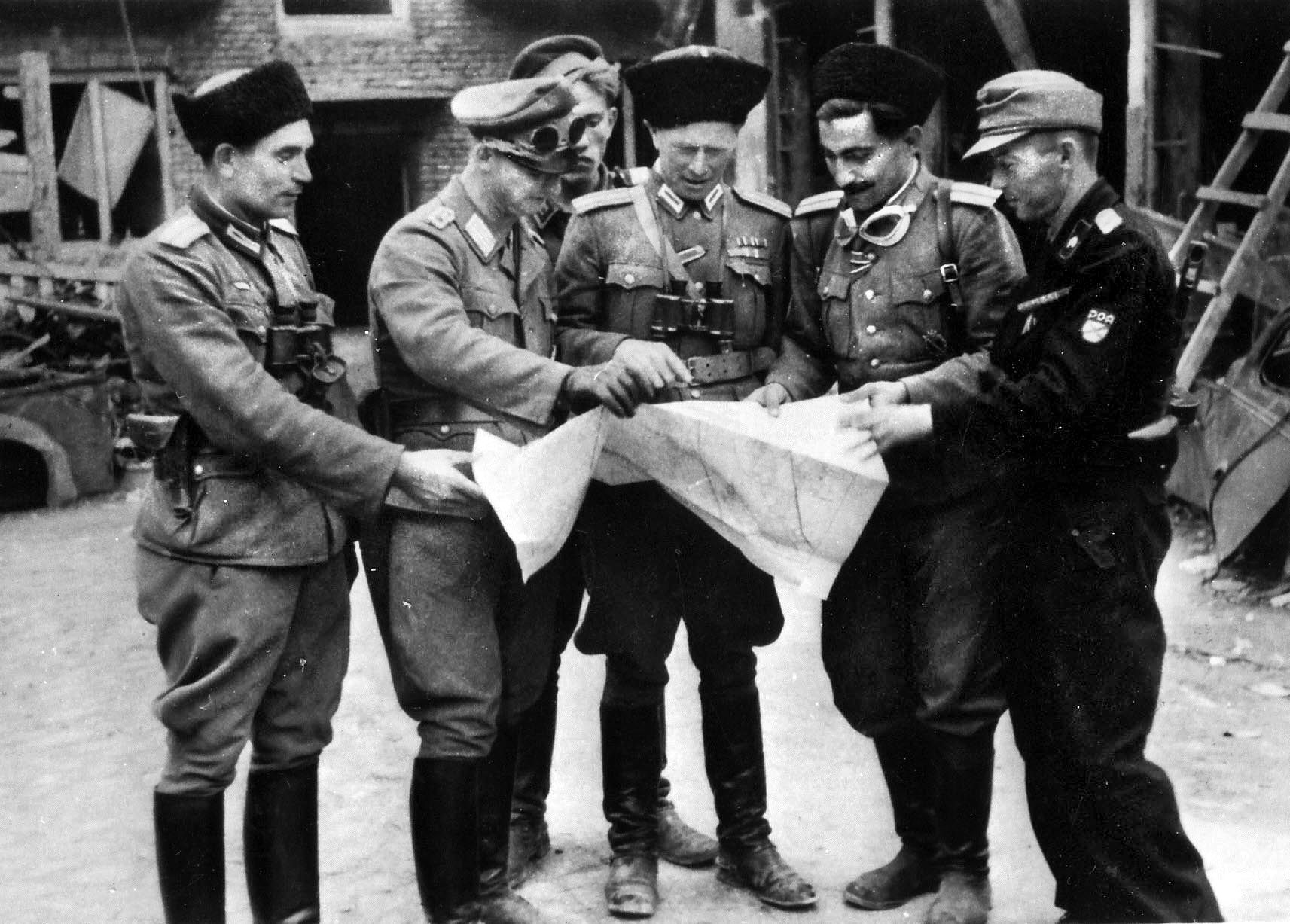 Major Ivan Denisovich Frolov (center) defected from the Red Army and commanded a unit of the Russian Liberation Army (RONA) that collaborated with the Germans to crush the uprising. Frolov was executed as a traitor by the Soviets in 1946. 