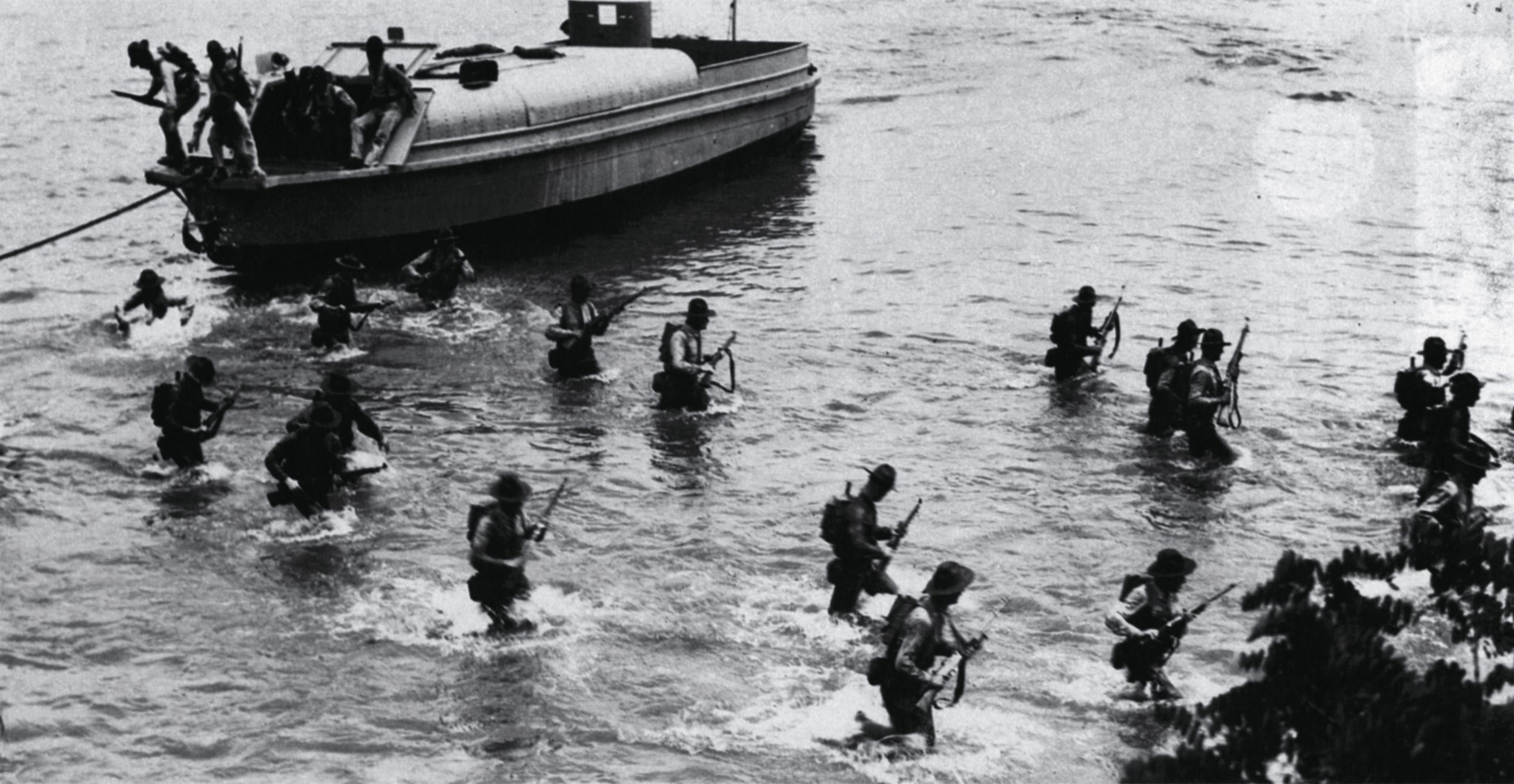 U.S. Marines train for an amphibious landing at Culebra, Puerto Rico, in 1924. The experimental landing barge shown in the photo proved to be unseaworthy and impractical.