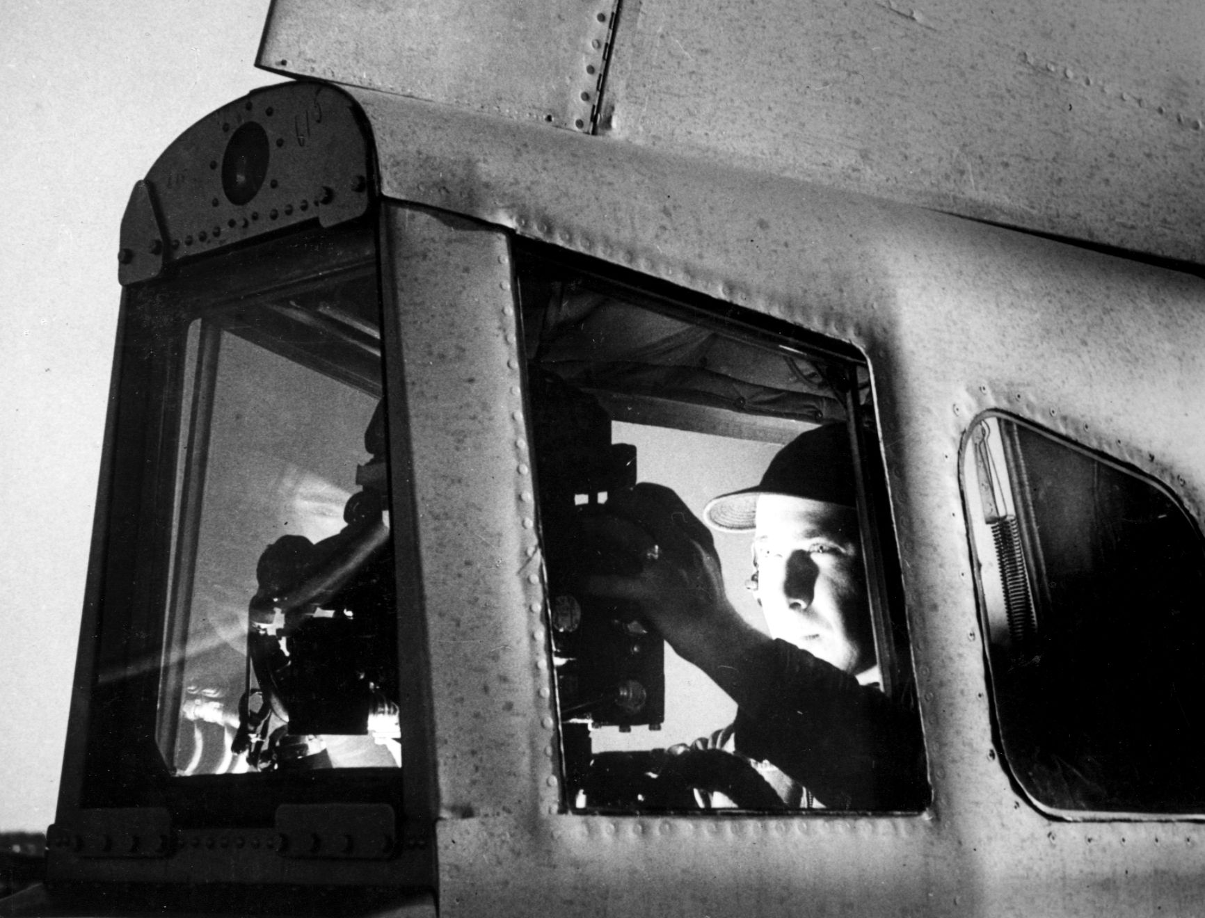 The tail gunner on a B-29 used a General Electric gunsight to train his remote-controlled guns on the enemy.