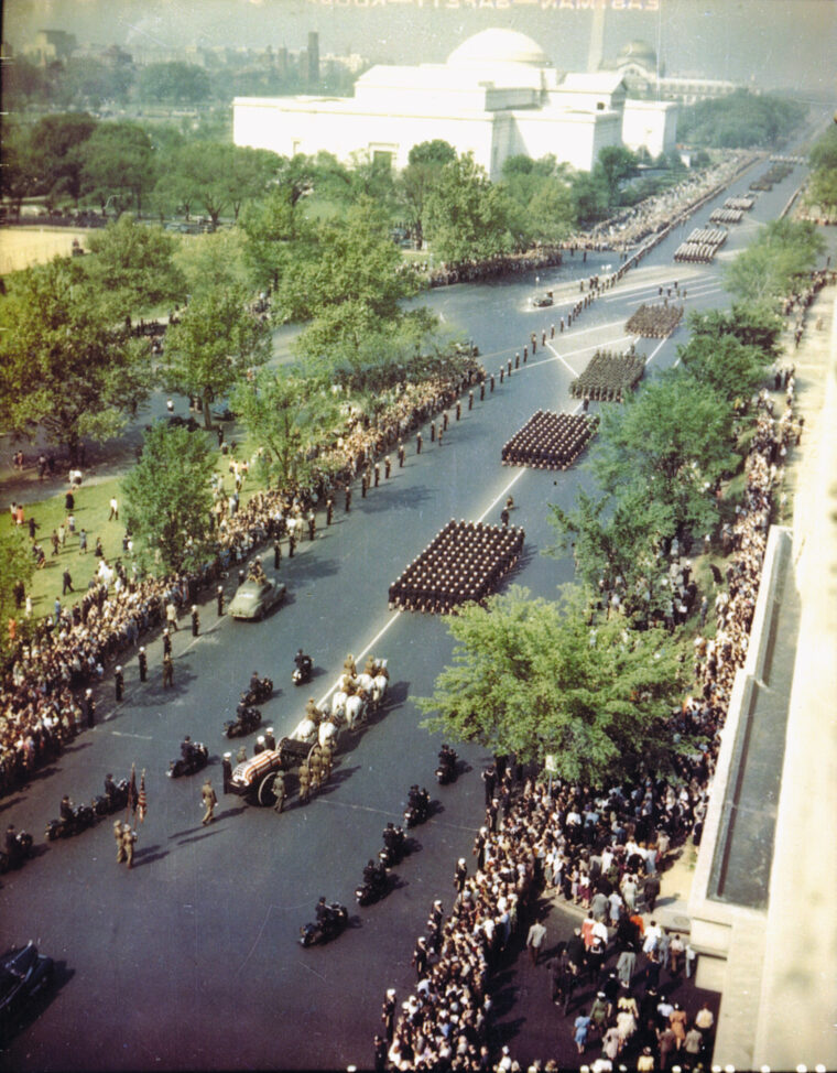 On April 14, 1945, Roosevelt’s funeral procession makes its way down Constitution Avenue past crowds of onlookers.