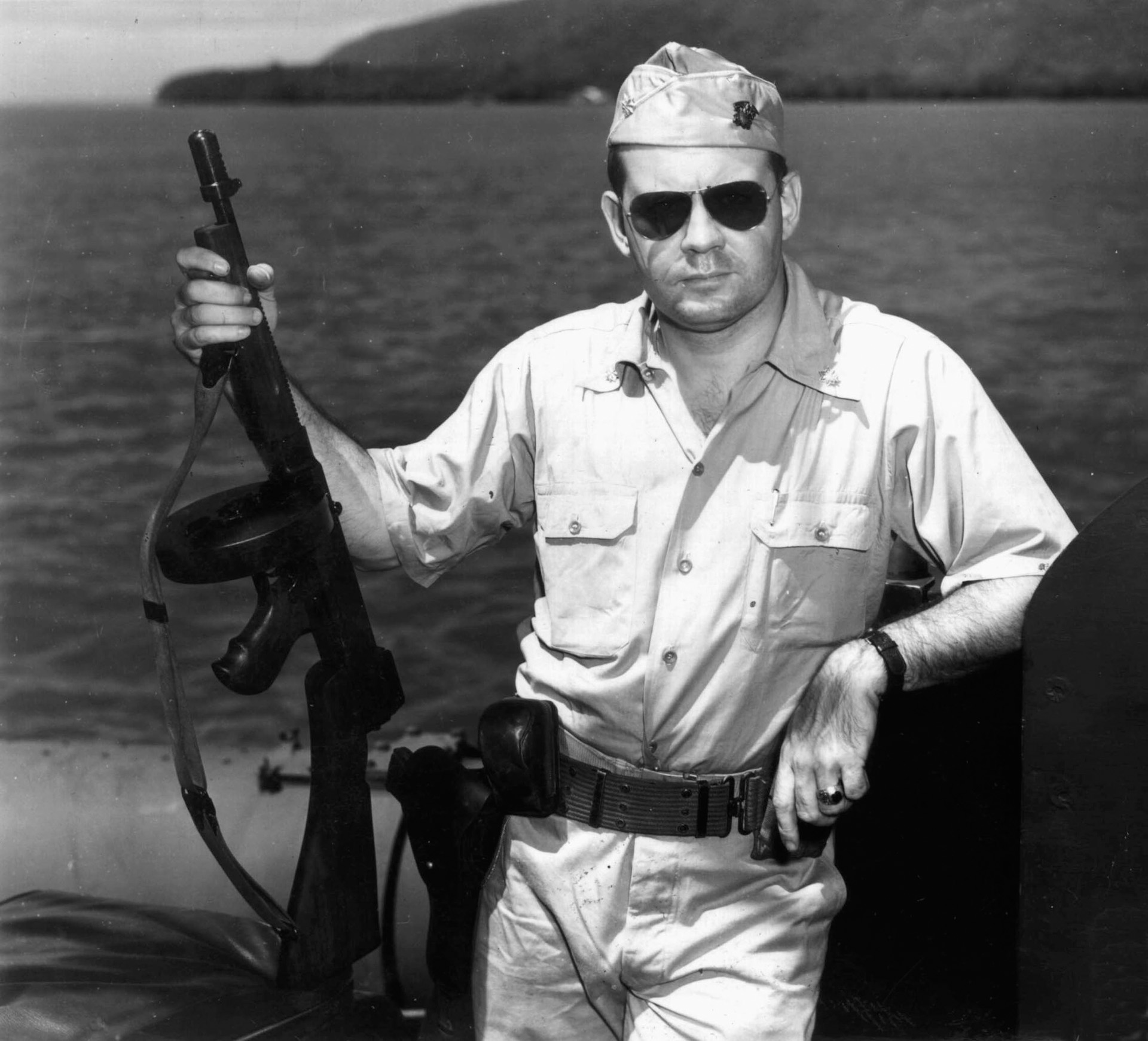 Intrepid PT boat commander John D. Bulkeley poses for the camera with an automatic weapon in hand. Bulkeley’s exploits in the Philippines would become the stuff of legend.