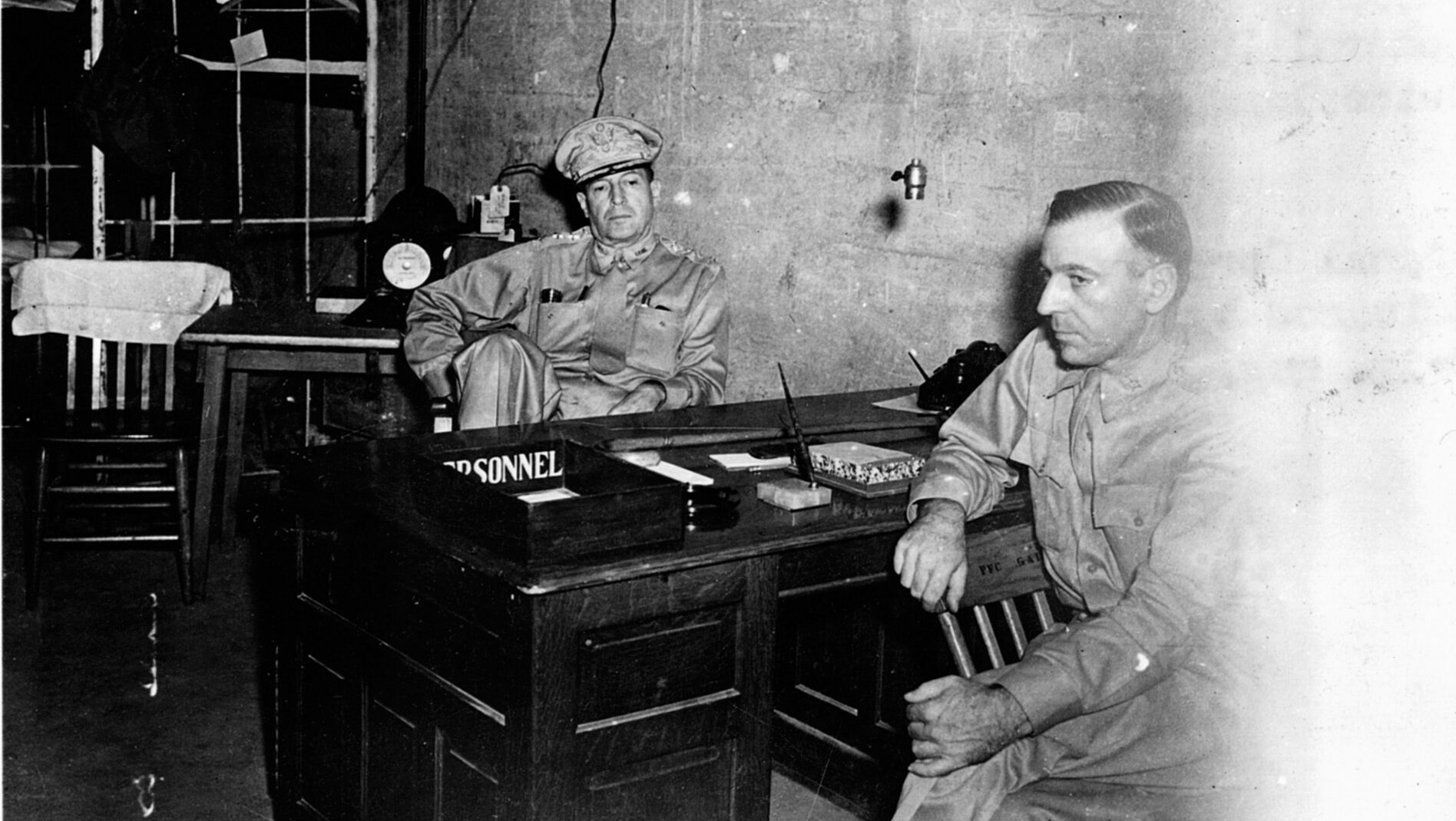 General Douglas MacArthur and Maj. Gen. Richard Sutherland confer at MacArthur’s headquarters on the embattled island of Corregidor.