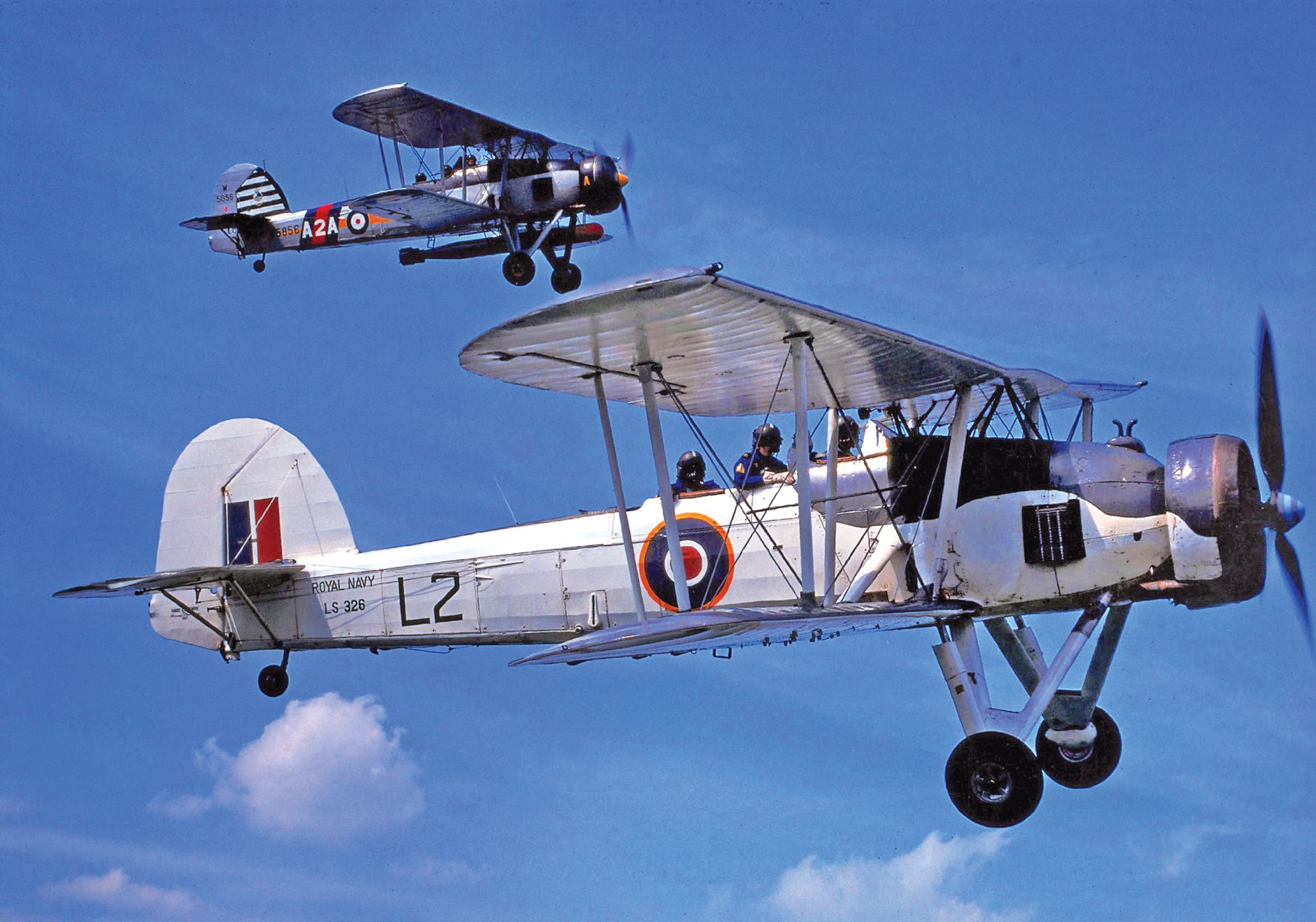 The Fairey Swordfish torpedo bomber was a flying anachronism by 1942, and today only two examples of the biplane survive, Mk II LS326 and Mk I W5856. These examples were given to the Royal Navy by Westland Aircraft Ltd. as a memorial to the men who served with the Royal Navy’s air service and the Fleet Air Arm from the inception of naval flight in 1909. During the 1960s, the Admiralty authorized the retention and preservation of historic aircraft capable of flight.