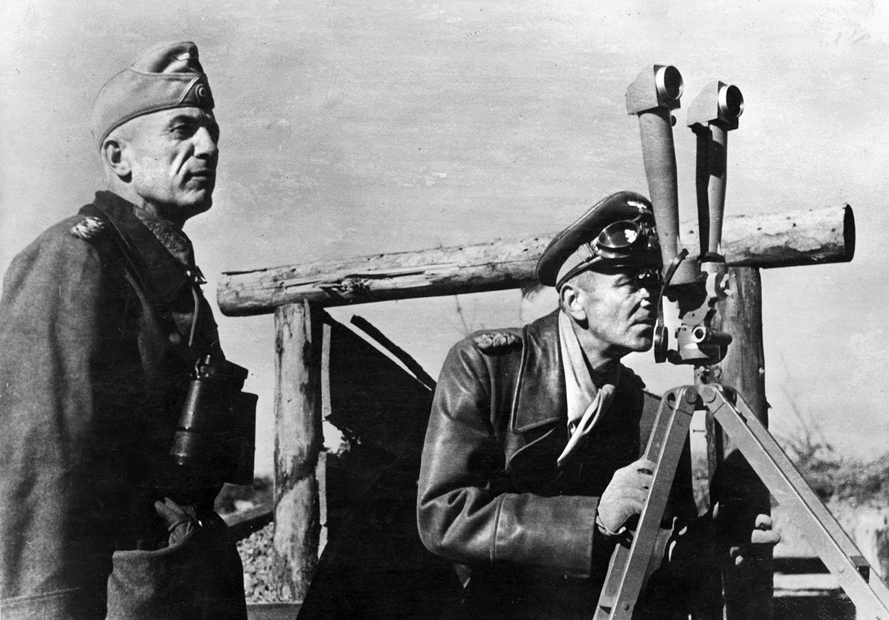 General Friedrich von Paulus peers through binoculars on the front. He led Sixth Army during the debacle of Stalingrad and surrendered to the Soviets rather than committing suicide. 