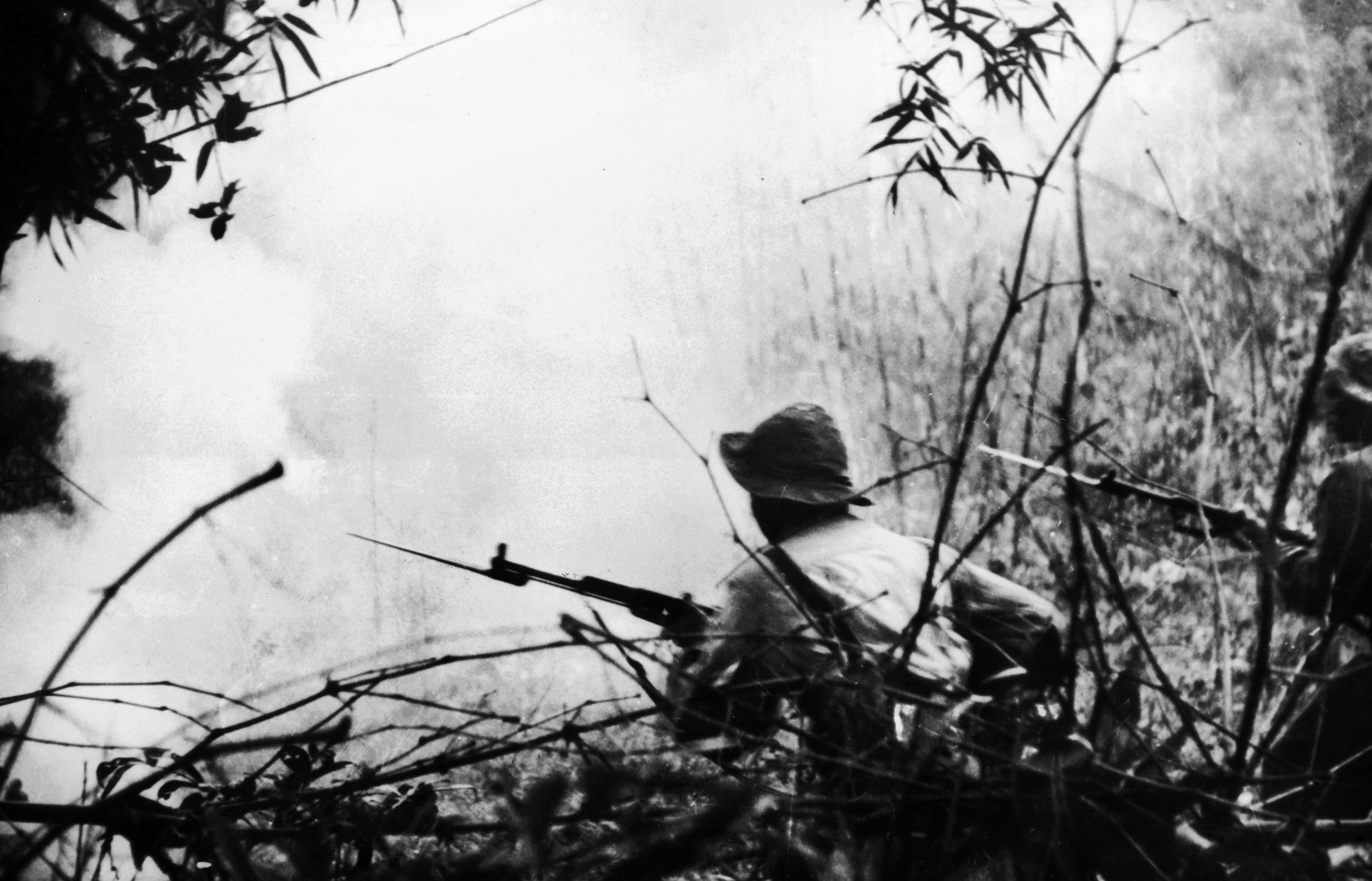 Viet Cong troops attack the city of Hue, Vietnam in early 1968. They had been stockpiling arms and other supplies months before the planned Tet Offensive, believing the civilian population of the city would rise up and join the fight.