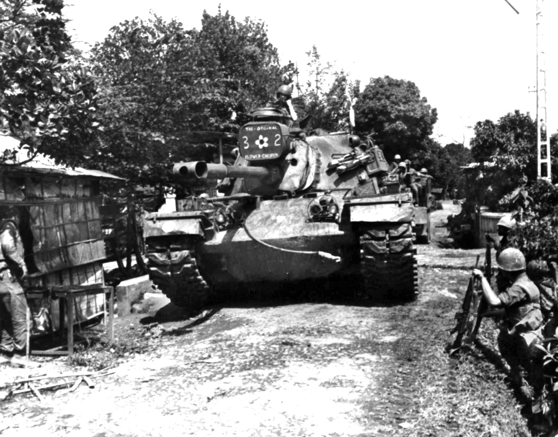 An M48 Patton Tank provides support to the 1st Battalion, 5th Marines in bitter street fighting in the imperial city of Hue, Vietnam, February 12, 1968.