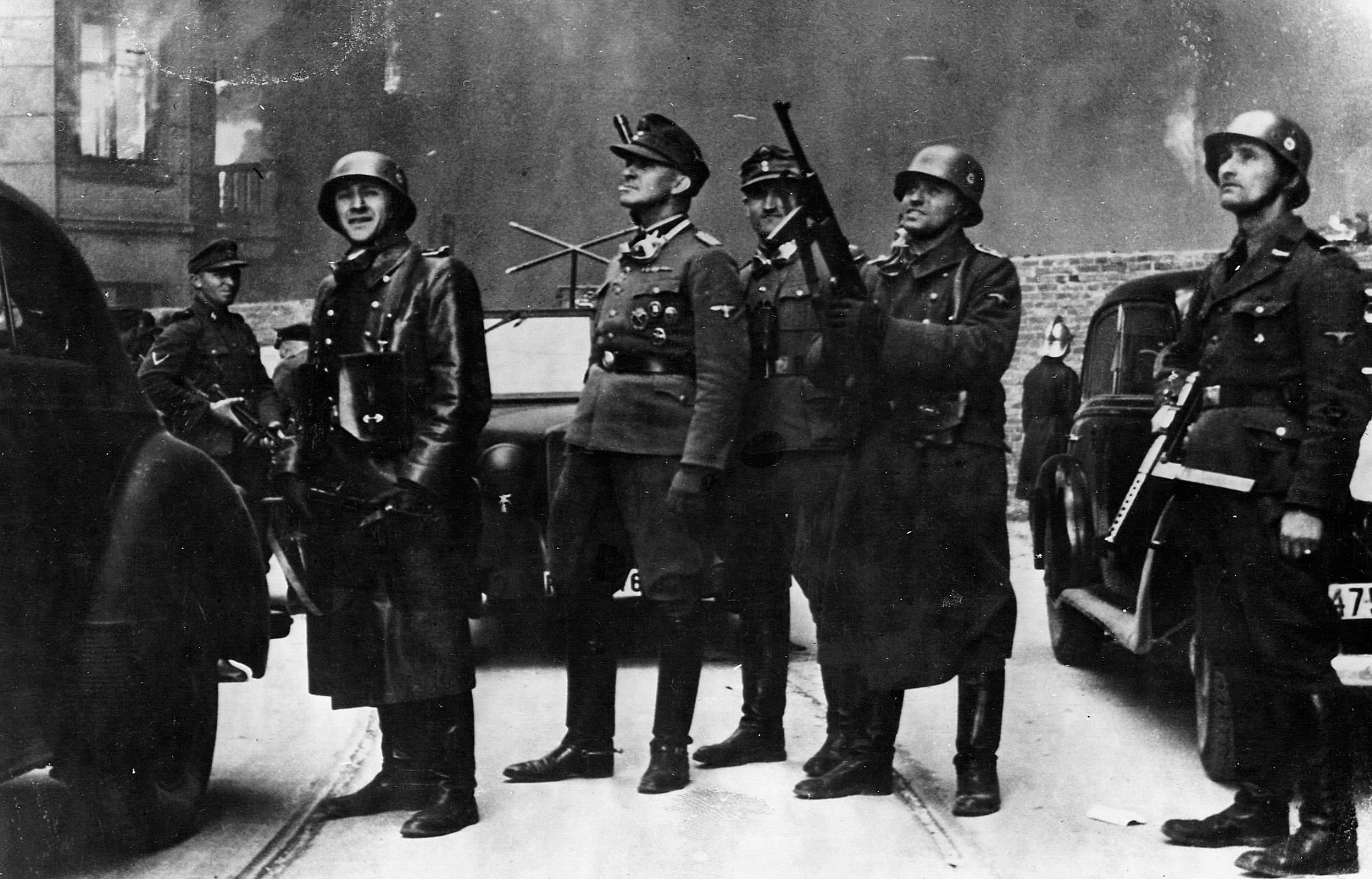 General Jürgen Stroop and comrades look on as the Warsaw Ghetto burns. 