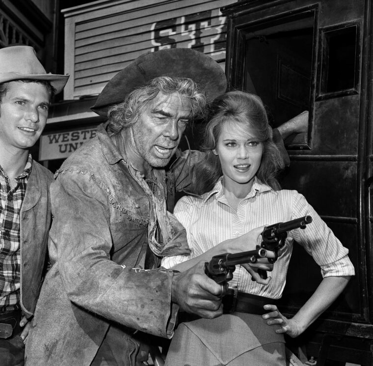 Lee Marvin and Jane Fonda in a 1965 Columbia Pictures publicity still for Cat Ballou.  Marvin won an Academy Award for Best Actor in the dual role of Kid Shelleen-Tim Strawn. At left is actor Dwayne Hickman who starred in the TV-show Dobie Gillis.