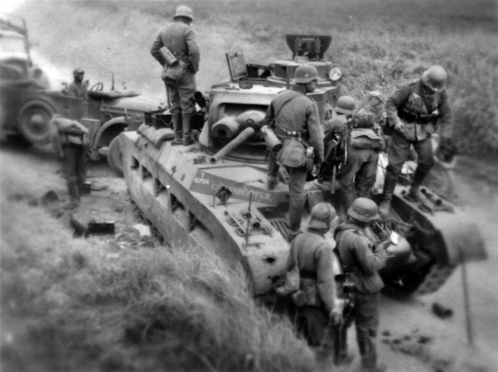 German troops examine a knocked out Matilda II. The tank was used effectively in the desert of North Africa, and served through the war.